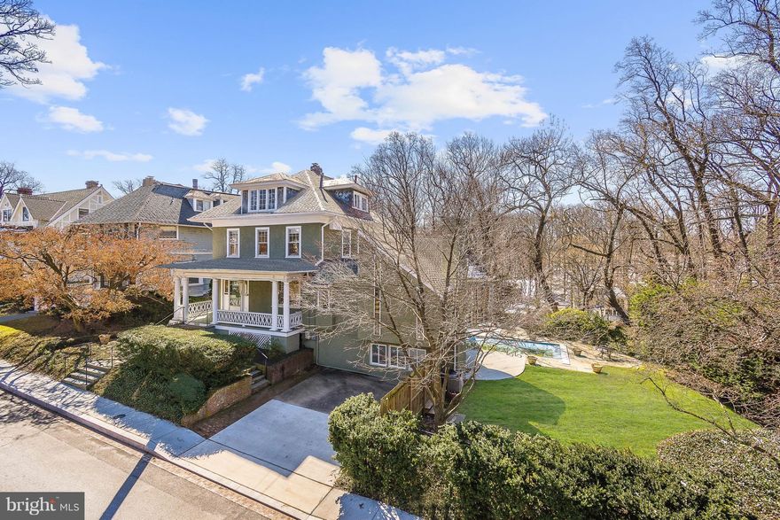 140' frontage on coveted Newark St w/ unrivaled privacy & woodland views! Open & airy interior w/ spectacular open Kit/Fam rm + formal LR & DR - all sun-drenched from south-facing walls of glass overlooking nearly 1 ac of grounds & w/ seamless flow to patio, large flat lawn, & POOL! 5BR up incl luxe owner ste w/ private deck, bright & finished LL. Easy walk to schools, shops, restaurants!