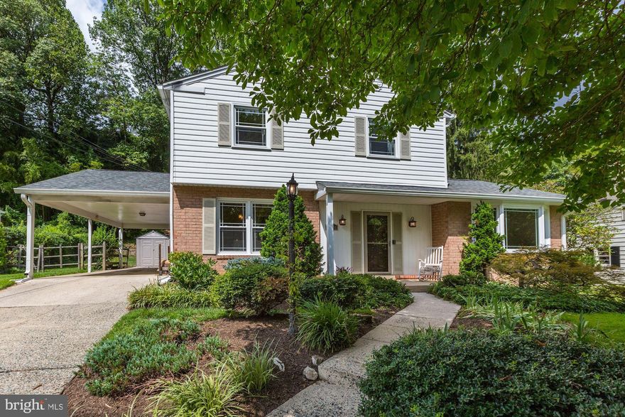 Gorgeous move in ready Colonial on large well landscaped lot.  Many wonderful features including an open table space kitchen/family room, three season porch off fr, two wood burning fireplaces, 4 good size bedrooms on second level including a spacious master with dressing area and full bath, finished lower level with recreation room, den/home office, workshop. Located convenient to Glenmont Metro and shopping.  Must see!