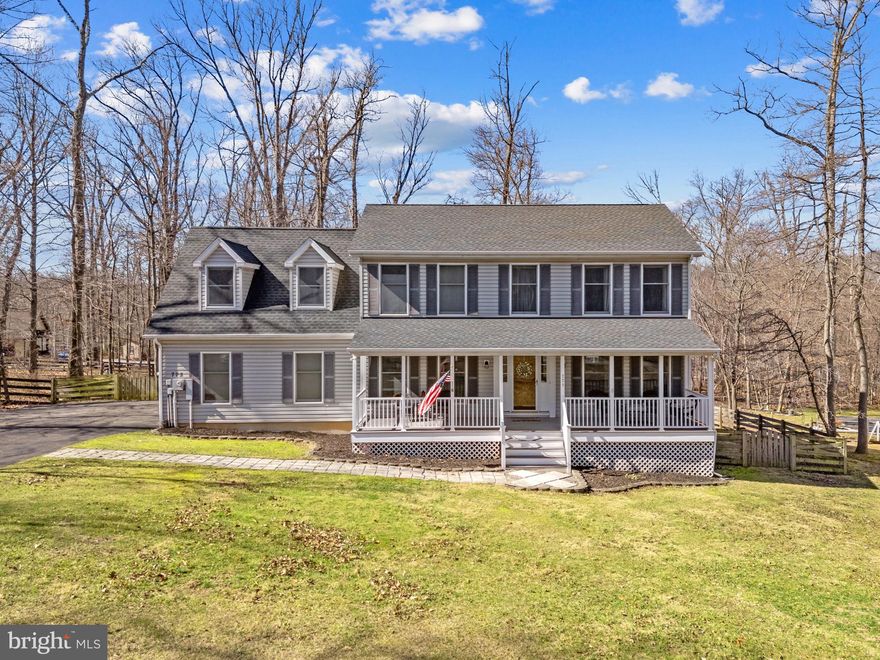 Custom craftsmanship and thoughtful updates come together in this spacious 4-bedroom, 2 full bath, 2 half bath home built in 2006 by custom builder Hampton Homes, located in the desirable Shannondale area of Harpers Ferry. Situated on .50 acres with no HOA, this property offers both privacy and convenience near some of the Eastern Panhandle’s most loved outdoor destinations.

Inside, the home offers 3,392 finished square feet with a layout designed for both everyday living and entertaining. The renovated kitchen (2020) features updated cabinetry, Corian countertops, stainless steel appliances, and a handcrafted poplar bar, creating a welcoming gathering space at the heart of the home. Flooring throughout includes a mix of luxury vinyl plank and carpet, while walk-in closets in three bedrooms provide generous storage.

The primary suite offers a comfortable retreat with a double vanity, whirlpool bath, and separate walk-in shower. Above the oversized two-car garage, a finished 12x15 room provides flexible space that can easily serve as a fourth bedroom, office, or guest room.

The fully finished lower level expands the living space with a large recreation room, a convenient half bath, and an 18x12 bonus room filled with natural light and a walk-in closet, making it ideal for guests, hobbies, or a home workspace. Ample storage areas add to the home’s practicality.

Recent improvements include a 30-year architectural shingle roof (2019), kitchen renovation (2020), Trex deck and sliding glass door (2023), and a new water heater (2023). The home is served by two heat pumps, with electric baseboard backup heat upstairs for added comfort.

Outdoor living is just as inviting. The Trex deck added in 2023 overlooks a fenced backyard with five-board fencing, offering space for pets, gardening, and outdoor gatherings. A stamped concrete patio, 10x15 storage shed, and motion and flood lighting add both function and convenience.

Located just minutes from historic Harpers Ferry, Shannondale Lake, the Appalachian Trail, and the Shannondale Springs Nature Preserve, this home provides easy access to hiking, water recreation, and the scenic beauty that makes this area so special.