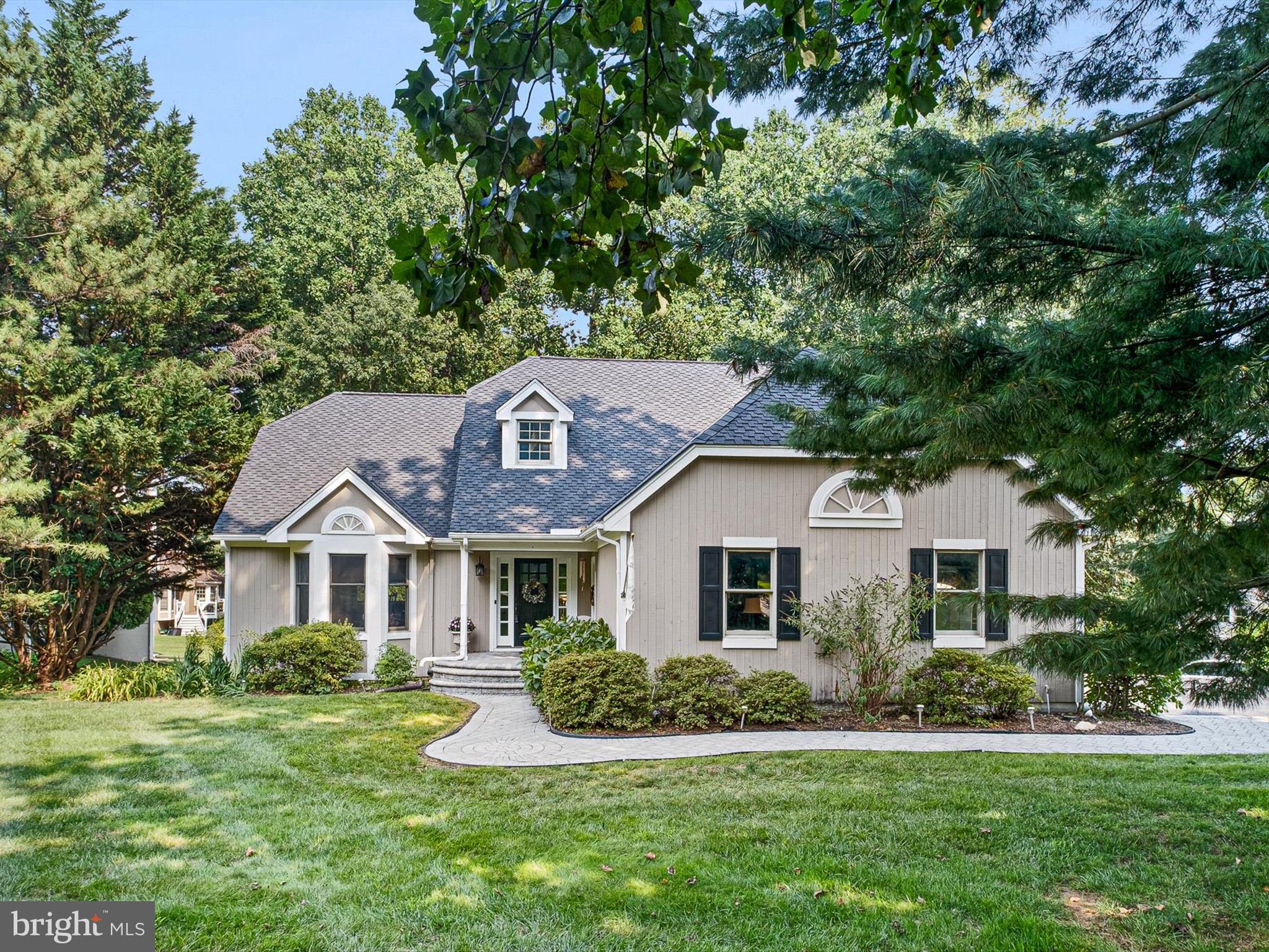 First Floor Master is a Real Plus!! Fabulous Floor plan!! The home is situated on a beautiful treed lot with lovely views from every window. Experience resort-style living every day in the desirable Somerset Lake community in Landenberg! This beautifully maintained home offers an exceptional lifestyle surrounded by natural beauty and unmatched amenities. Enjoy access to a scenic 28 acre lake, clubhouse, outdoor pool, tennis and basketball courts, playground, and walking trails—perfect for those who love an active and social community. Step into a grand two-story foyer that leads to spacious living and formal dining room—ideal for entertaining. The inviting family room features a cozy fireplace, skylight and glass doors that open to the rear deck, seamlessly connecting to the heart of the home: a stunning eat-in kitchen with granite countertops, a large island with breakfast bar, stainless steel appliances, white cabinetry, and a stylish tile backsplash. The main floor primary suite is a true retreat with vaulted ceilings, two walk-in closets, and a spa-like bath with soaking tub, double vanity, and separate shower. A powder room, laundry room, with access to the two-car garage complete the main level. Upstairs, you'll find two generously sized bedrooms and a full bath, perfect for family or guests. The finished walk-out lower level adds flexible living space for an in-law suite or home gym, game room, media area, or whatever suits your needs. Step outside to a private backyard oasis framed by mature trees and vibrant landscaping—ideal for relaxation and outdoor gatherings. Live where others vacation! Don’t miss this rare opportunity to own in Somerset Lake—where every day feels like a getaway.