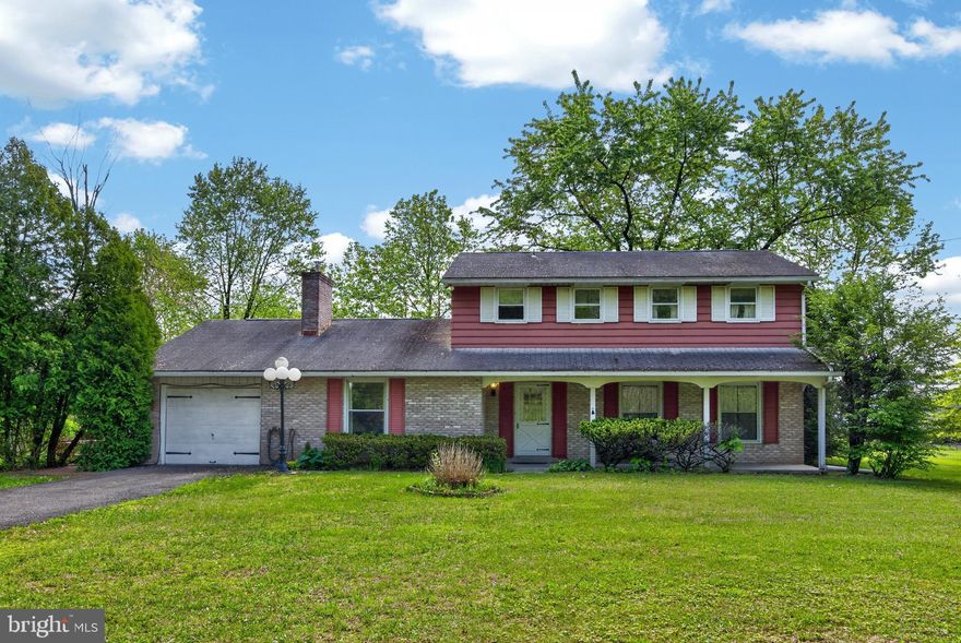 314 Neiffer Road welcomes you with its first ever market debut!  Come escape to tranquility at this classic 4 bedroom, 2.5 bathroom colonial that is nestled on a picturesque 2.16 acre lot.  Located in Limerick Township within the highly sought after Spring-Ford School District.  Pull on into the  paved driveway that offers ample parking space for 5+ vehicles and is large enough to park an RV.  The backyard greets you with a serene and spacious sanctuary.  The custom built goldfish pond with a gorgeous stone waterfall will provide hours of relaxation.  The rear covered porch and patio allow you to look out across the level and luscious yard and mature trees & shrubs.  Come on inside to this 2,186 square foot home which offers generous living areas.  The main floor offers a welcoming family room that harbors a cozy wood stove and amazing view of the backyard making this a comfy area to settle in.  The family room is the ideal spot to enjoy the lovely warm weather days with the sliding doors open while you breathe the fresh outdoor air.  The expansive kitchen provides plenty of cabinetry and lots of open space that is perfect for gatherings and hosting dinners.  The formal living room adds additional entertaining space and the half bathroom providing convenience completes the main floor.   Following the beautiful oak hardwood staircase upstairs will lead you to 4 spacious bedrooms, 2 full bathrooms, and allergy friendly hardwood floors.  Full basement, garage, shed, and 2 separate attic spaces provide an abundance of storage space.  The property's  expansive lot  provides endless opportunities for outdoor enjoyment.  like gardening  and playing games. Shopping is at your fingertips as well as easy access to major roadways.  Experience the perfect blend of country living and modern convenience; with ample space for relaxation, entertaining, and recreation.  Have you scheduled your tour yet?  Don't blink or you will miss out on this unbelievable opportunity!