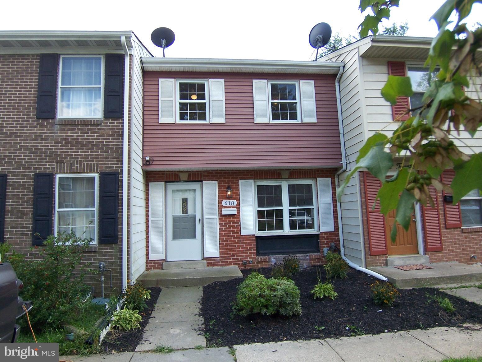 Dream big! Welcome to this charming 3-bedroom, 1-bath townhome, ideally located for effortless commutes! Step inside to find new carpeting in the lower level and a kitchen ready for your culinary adventures, featuring sleek granite counters and stainless steel appliances. The finished walk-out level basement offers extra space for all your needs, while the fenced rear yard provides a private oasis. Enjoy outdoor living on the balcony-style deck, or relax on the paver patio below. This home is a delightful find in a convenient location!