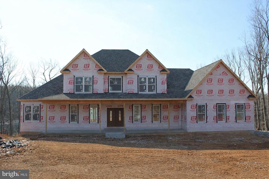 Privacy trees will be planted around the front yard. The front yards goes way beyond the construction fence. Call realtor for more info.
 
Welcome to a home that blends timeless farmhouse character with modern-day luxury. This beautifully designed residence offers 3,626 square feet of thoughtfully crafted living space, featuring 4 bedrooms, 3.5 baths, and a 2-car garage. From the moment you arrive, you’ll be captivated by the inviting farmhouse architecture accented with a striking graystone highlight across the front façade, creating curb appeal that’s both classic and unforgettable. Set on a private, elevated lot surrounded by mature trees, this property offers the perfect mix of serenity and sophistication.

Inside, the home is rich with luxury details and versatile spaces. The main level includes a master suite with walk-in closet as well as a guest suite, offering comfort and flexibility for family or visitors. Upstairs, a second master suite ensures privacy and convenience, while additional bedrooms and a loft create ample living space.

The heart of the home is the open-concept kitchen, designed for both entertaining and everyday living. Featuring a large island, walk-in pantry, and a wet bar/kitchenette, it flows seamlessly into the great room and family room, all enhanced by vaulted ceilings and a cozy fireplace. Additional rooms include a dedicated office/den, sunroom, main-floor laundry, and flexible unfinished future space—perfect for storage or expansion.

The home also offers unique lifestyle amenities, including a potential wine cellar, a side-entry garage, and multiple outdoor living areas: a covered front porch, rear porch, balcony, screened porch, courtyard, sundeck, grill deck, and even an outdoor fireplace—ideal for gatherings in every season.

With options to customize finishes, reverse the floor plan, or finish the basement to create even more living space, this residence is as adaptable as it is beautiful. Whether you envision a media room, gym, or guest retreat, the possibilities are endless.

This home is more than just a place to live—it’s a farmhouse retreat where luxury, comfort, and timeless design come together on a truly one-of-a-kind lot.