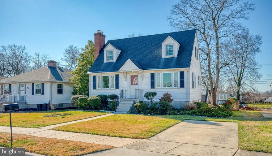 Absolutely charming & spacious Cape Cod on a lovely street in desirable neighborhood close to shopping, dining, & schools.  This move-in ready home, meticulously mainted by long-time owners, has been freshly painted from top to bottom,  with hardwood flooring under carpet (exposed HW in DR).  Enter into the foyer leading to living room w/wood burning fireplace, separate dining room, main-level bedroom, half bath, & eat-in kitchen; two additional bedrooms & full bath in the upper-level.  The fully finished & carpeted lower-level boasts a built-in bar for entertaining, & walk- up stairs to the yard.  As if this isn't enough, there is an awesome sunroom addition off the kitchen with heat pump for year round enjoyment!  The deep flat back yard is perfect for outdoor barbeques with friends & family.  Replacement Pella windows, gutter helmet, upgraded electric, roof 10 years w/30 year shingles,.  See it before it's gone!