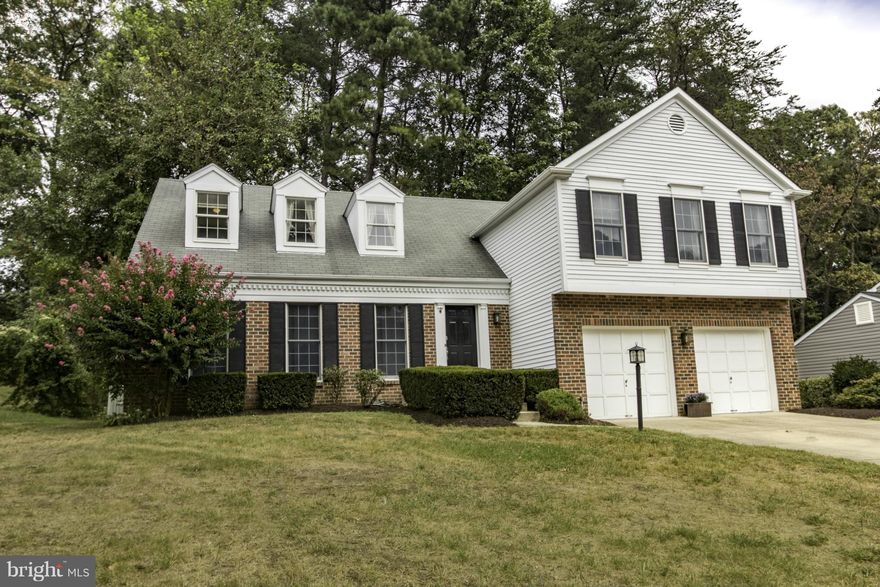 Classic 5/6 BR colonial with numerous elegant upgrades. Brazilian hdwd floors on ML, gourmet kitchen with granite counters and SS appliances, fam rm with wood burning FP, expansive master BR with attached sitting rm, tastefully remodeled bathrooms with skylights, fully finished lower lvl with new carpet. New deck backing to woods. Pool Bond conveys. Severna Park schools. Convenient to Rtes 97 & 50