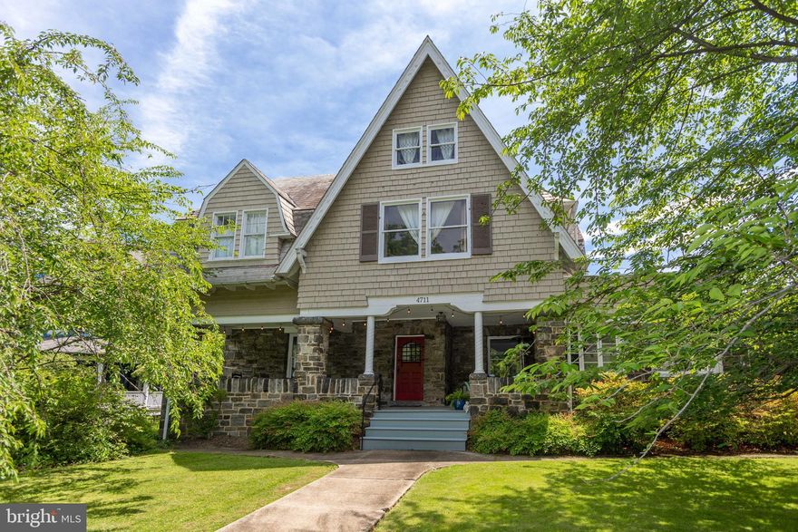 Welcome to 4711 Roland Avenue. This grand but very livable home is one of the oldest in the neighborhood.  Nestled in mature plantings, the stone columned front porch awaits. As soon as you enter you will imagine evenings spent there with friends and family. Once inside the house you will feel light and openness on both sides. To the left is a large library which could be an office or a separate sitting room. To the right is the living room that opens onto the expansive, enchanting sunporch. The elegant dining room is where you can host dinner parties and extended family gatherings with ease. The updated kitchen with marble countertop has a butler's pantry and mud room adjoining. Original details greet you at every turn: stained glass, oak staircase, and circular turret spaces.
The second floor has a large Primary bedroom with ensuite updated bath and three additional bedrooms with two more baths and a laundry room.
On the third floor you will find three bedrooms and a renovated bath.
Two car garage built in 2005 and 3 extra parking spaces at the back of the yard can be reached from the alley
Enjoy all that Roland Park has to offer: restaurants, shops and grocery within a short walk, neighborhood pool, nearby public and independent schools, walking paths and cummunity events. Close to 83 for an easy commute.
