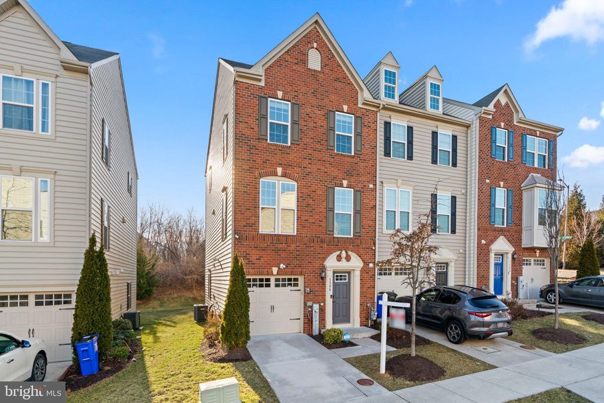 Step into the epitome of modern elegance and unparalleled convenience with this exquisite 3-story townhome, a masterpiece of design that warmly welcomes individuals and families at all stages of life, including those with pets. This townhome stands out with its stunning brick facade, seamlessly blending sophisticated aesthetics with functionality, including an EV charging (240v) and an abundance of smart home features for a connected and convenient lifestyle.
The journey begins on the ground floor, where an inviting entryway adorned with hardwood flooring sets the tone for the refined elegance that flows throughout the home. This level introduces a versatile space, perfect for a variety of uses such as a home theater (pre-wired), home office, entertainment center, or guest room, highlighted by direct access to the home's prized feature—a spacious, private backyard through elegant French double doors. Also housed on this floor is a full bathroom with additional space designated for a powder room, currently utilized as a practical closet, alongside access to a generous 1-car garage equipped with a myQ smart opener, ensuring ease and security.
Ascending the wooden stairs to the second floor, the heart of the home unfolds into a sun-drenched living area, boasting hardwood floors that extend into a gourmet kitchen. This culinary haven is equipped with granite countertops, ample cabinet space enhanced by under-cabinet lighting, a central island for gathering, and sleek stainless-steel appliances, making it a dream for cooking enthusiasts. Adjacent to the kitchen, the dining area, featuring a bar/buffet closet with lighting and a modern chandelier, offers French double-door access to a large, maintenance-free deck. This deck not only provides the perfect setting for entertaining but also offers a serene view into the woods providing natural privacy, a rarity in townhome living that promises endless outdoor enjoyment and gatherings.

The top floor is dedicated to rest and relaxation, housing the luxurious master bedroom suite complete with a soaking tub, walk-in shower, double vanity sink, and a spacious walk-in closet, epitomizing comfort and style. The additional bedrooms are bathed in natural light, each offering ample storage space. A full hallway bathroom, hardwood flooring throughout, and a laundry area equipped with a new washer and dryer (2023) ensure both functionality and elegance. Throughout the home, recessed lighting, smart lights, and switches allow for an ambiance tailored to any mood or occasion.
This townhome represents a harmonious blend of luxury, comfort, and practicality, designed to cater to the dynamic needs of today's homeowners. From the thoughtful inclusion of hardwood floors and wooden stairs that add a touch of warmth, to the under-cabinet lighting in the kitchen that illuminates culinary tasks, every detail has been meticulously crafted. With its unique blend of indoor charm and outdoor splendor, this residence is not just a house but a home that promises a lifestyle of ease, elegance, and enjoyment for all who dwell within.