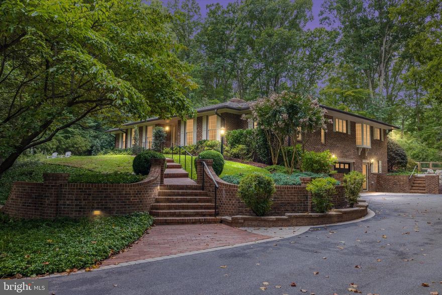 A rare opportunity awaits on one of the most private streets in Harbor Hills. Surrounded by gorgeous hardscape, flowering crepe myrtles, and professionally designed gardens, this home offers both beauty and privacy. The deck overlooks a fully fenced, level yard providing the perfect outdoor setting—whether for entertaining, play, or simply unwinding in a peaceful natural backdrop.   The main level is designed for comfort and connection. The family room is anchored by a striking fireplace that adds both charm and character. A bright sunroom overlooks the backyard, creating an ideal spot for morning coffee, reading, or evening relaxation. The kitchen includes a casual eat-in space, while the separate dining room and combined living area provide the perfect setting for holidays and gatherings with loved ones.   The updated lower level adds even more versatility with a spacious recreation room, flexible-use space, and a private office with its own entrance—perfect for work, study, or creative pursuits. An attached two-car garage and additional storage room complete the home’s thoughtful design.  
Living in Harbor Hills means enjoying one of Davidsonville’s premier waterfront communities along the South River. Residents have access to a private a waterfront clubhouse with year-round activities, a community pool, tennis and pickleball courts, ballfields, playgrounds, and a sandy beach with picnic pavilion. Water enthusiasts will appreciate neighborhood boat slips and sturdy kayak storage racks.   
This unmatched location offers serenity and seclusion, yet remains only minutes from Annapolis and within easy reach of Washington, D.C., Baltimore, and Northern Virginia. With convenient access to major routes, shopping, dining, and schools, Harbor Hills is where natural beauty, recreation, and community come together.

Amenity Locations:
Pool, Pier, Tennis Location: 1 Carson Cove
Ball Field Location: Drive-in on Constellation Dr. Walk-in entry at Godspeed Drive
Beach Area Location: Gated entry at end of Constellation
Merrimac Waterfront Location: Near the end Merrimac Road, on the right