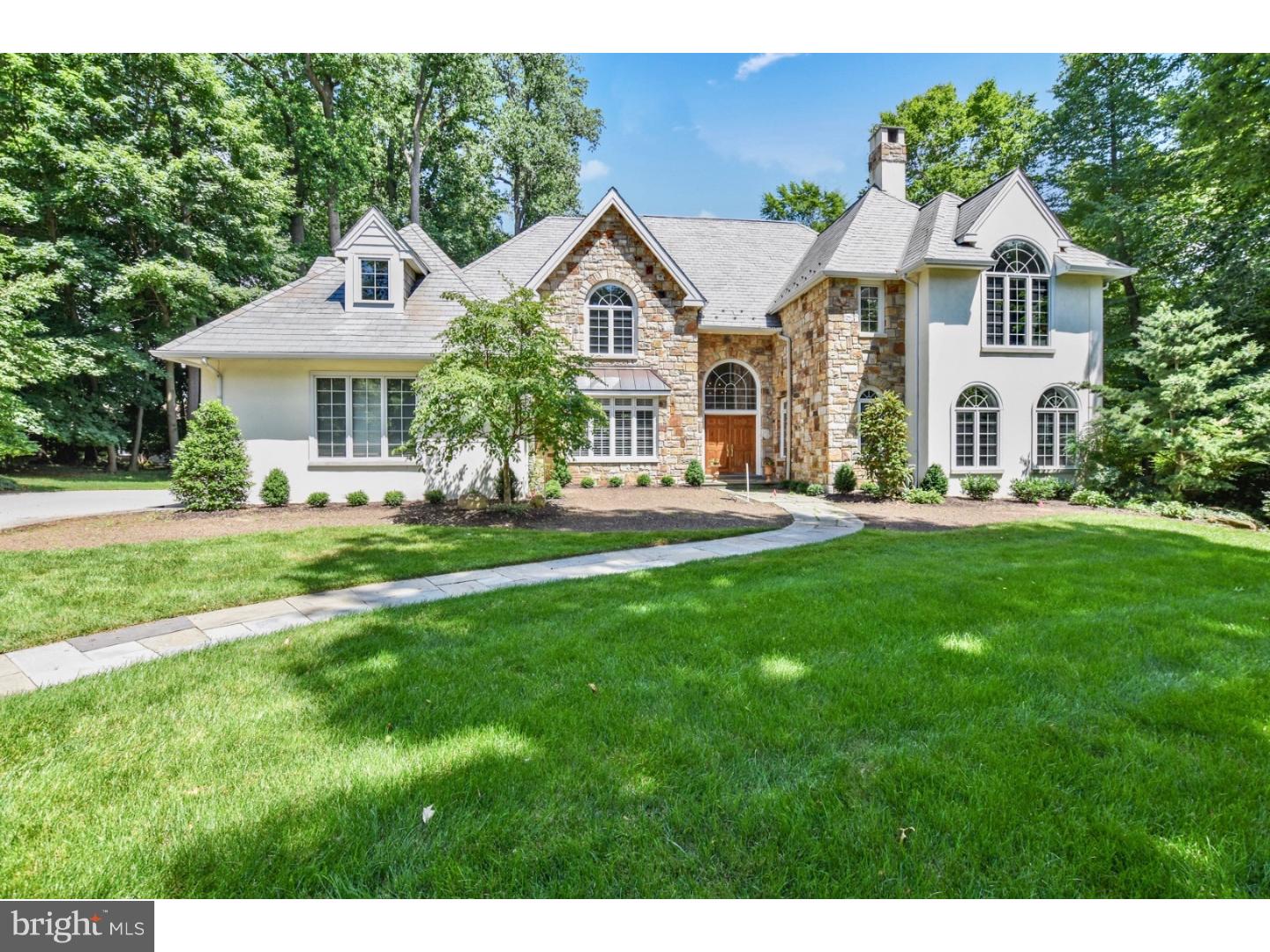 NEW LISTING - NOT PREVIOUSly ON MARKET!!! This beautiful home is located in the highly desirable D'Orsay community, and enjoys the quiet cul de sac setting of this small community of 30 homes built by CF Holloway. Meticulously updated and renovated over the past few years, this home exhibits the quality and character not usually found in newer homes. Highlights include stunning custom woodwork, wainscoting and moldings, pocket doors with antiqued mirrors, interior French doors with beveled glass, Hard wood floors throughout most of first and second floors, three gas fireplaces, stunning palladium windows in many rooms and each room has its own character and style. The 2 story elegant Foyer features curved wall and staircase. The stunning Living Room has a magnificent coffered ceiling, unique arches and doorways, and a beautiful two sided marble fireplace that also graces the Library, a remarkable with 5 palladium windows. Formal Dining Room with wainscoting and lovely moldings, a two story Great Room with floor to ceiling stone fireplace and open to the beautifully renovated Kitchen with quartz counters, high end custom cabinetry, two full size side by side gas ranges, large island with granite top and separate breakfast room. Two PRs and Butler's Pantry also renovated, show the attention to detail. Circular flow and open floor plan designed for informal entertainment as well as more formal events. Spacious MBR with stunning and stylish new MBA with gorgeous tile floor, large stall shower, double vanities and built-ins with window seat, and large walk-in closet completes the master suite. The additional four bedrooms are all very large with excellent closet space. Two Bedrooms share a connecting Bath that was completely renovated and flair and character. Fourth and fifth Bedrooms share the new hall Bath, redesigned and renovated with high quality and unique features. All Bedrooms have wood floors. Basement playroom has a simple and clean finish, and is large enough for many different activities to go on at the same time. A secluded and intimate flagstone patio is the perfect spot to enjoy the fenced backyard. Wonderful home in award winning Radnor School District.