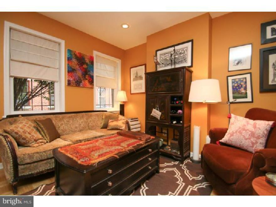 Pristine and Perfect 2 bedroom house on a charming street in Graduate Hospital.  This house is filled with character, and has been very well maintained. The first floor has an open living room and dinning room separate from the kitchen with beautiful hardwood floors.  The updated kitchen features granite counter tops, plentiful custom cabinets, and stainless steel appliances.  The windows from your kitchen look out onto a charming patio with draping grapevines and ample space for entertaining indoors and out.  The second floor is bright with natural light pouring in from the skylight in the newly finished beautiful bathroom, in addition to the second skylight directly above the staircase.  The master bedroom is cozy and bright boasting of a width of three windows. This house is a gem and and a must see.