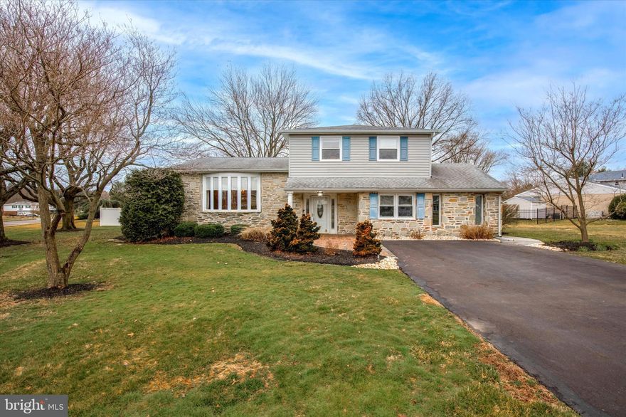 Offer Deadline is Monday (3/11) at noon, Sellers has the right to accept an offer sooner.  Welcome to this charming home nestled in the desirable Albidale neighborhood, boasting a legacy of only two previous owners. Situated within proximity to Albidale Park and benefiting from its locale within the renowned Lower Moreland school district, including the recently constructed brand new high school.  Stunning property boasting an oversized lot and professionally landscaped grounds, offering unparalleled beauty and space for outdoor enjoyment.  As you enter, you are greeted by a spacious and inviting foyer, leading seamlessly into the oversized living room adorned with a bay window, which gracefully transitions into the dining room, creating an ideal space for entertaining guests. The eat-in kitchen featuring ample room for a table, stainless steel appliances including a dishwasher and fridge, a gas range, and pendant lighting illuminating the stainless steel sink. The kitchen is further enhanced by its wooden laminate flooring and convenient access to the elevated deck through the breakfast room.  Relax on the spacious (23' x 14') deck accessible through the door from the breakfast room.  The wooden deck is 10 years young and was refinished this past fall.  Upstairs, three generously sized bedrooms await, providing comfortable accommodations. The hall bathroom boasts a dual vanity and linen closet, while the main bathroom has been expanded and tastefully updated with a modern shower, vanity and newer flooring.  The ground level of this home offers versatility with a fourth bedroom featuring a walk-in closet, accompanied by a convenient half bath. The family room is a cozy retreat (with brand new carpet), complete with a wood-burning fireplace and a stone mantel, with access to a covered porch, perfect for enjoying the outdoors in any weather.  Additional features include a basement, with one room soundproofed for added privacy, and the other area providing flexibility for various needs. Storage space is plentiful, with an additional area off the side of the house for bikes or yard equipment.  Bright and airy throughout, this home exudes potential and awaits its next chapter. While some updating may be desired, this property presents an excellent opportunity to create a personalized haven. Don't miss your chance to make this house your home!