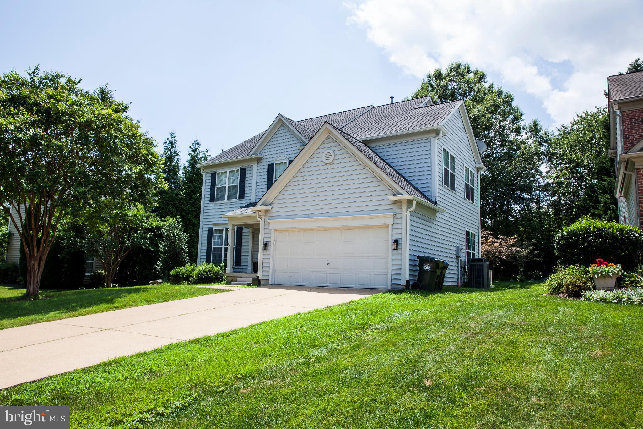 Nestled on a private drive at the end of a quiet cul‑de‑sac in Crosspointe, this colonial delivers more than 3,600 finished square feet of sun‑filled space. Wide‑plank hardwood floors grace the main and upper levels, anchored by a dramatic two‑story family room, loft overlook, and an open kitchen with white quartz counters, stainless appliances, and sleek cabinetry. Upstairs you’ll find four generous bedrooms, a bedroom‑level laundry, and a reimagined primary bath with soaking tub and frameless shower. The main‑level study doubles as a guest room, while the walk‑out lower level adds a huge recreation lounge, full bath, and true fifth bedroom. Backyard gate connects directly to Burke Lake Park’s trail network. Community amenities include two pools, tennis and pickleball courts, playgrounds, and a stocked fishing pond. Gas heat, underground sprinklers, fresh designer paint, and Pottery Barn sailcloth drapes convey. Zoned for Silverbrook Elementary and South County Middle and High Schools. Schedule your private preview today.