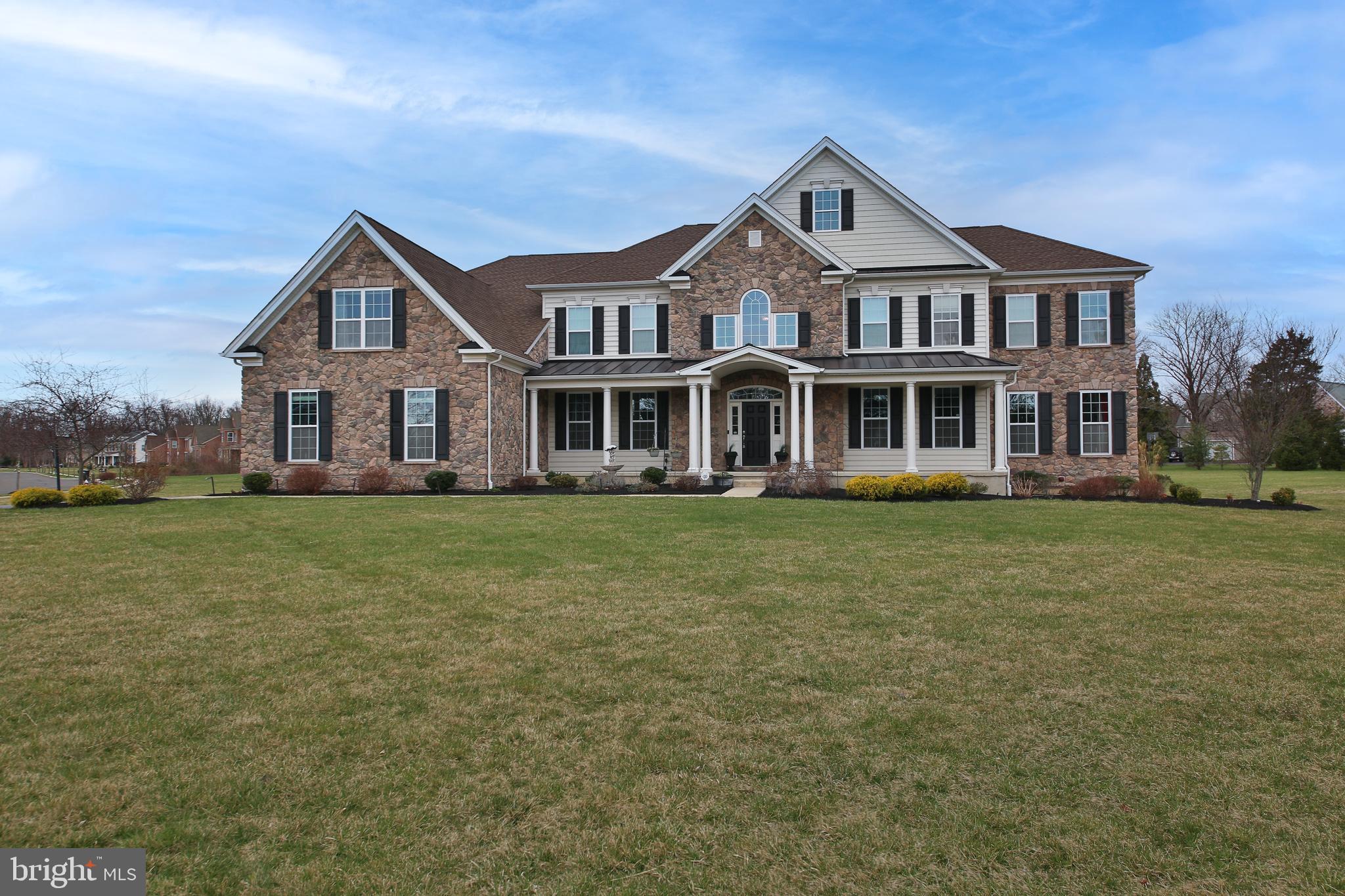 Beautiful estate home now available in highly desirable Plumstead Preserve! This 6 bedroom, 5.5 bathroom home features numerous upgrades. As you enter the foyer, you will see a grand dual oak curved upgraded staircase that is a show stopper! The convenient living room includes crown molding, chair rail, double windows and a luxurious chandelier. Directly off the living room is an oversized in-law suite with a full bathroom and walk in closet. The spacious dining room is fantastic for entertaining and has recessed lighting, oversized baseboards, chair rail, and crown molding. The lovely expanded family room includes a gas fireplace, ceiling fan, recessed lighting and oversized windows that allow plenty of sunlight into this exquisite room. Located directly next to the family room, the gourmet kitchen with full breakfast area features an oversized island, stainless steel appliances; double bowl sink, gas Viking range with vent hood, a built-in microwave/oven combination, recessed lighting and an abundance of cabinet space. Enjoy your morning cup of coffee in the gorgeous sunroom which includes a freestanding standing fireplace with gel fuel, ceramic tile and a wealth of windows. A door off the breakfast room leads to the deck and to the back yard. A large office, a powder room, mud room, laundry room, and additional flex room complete this first floor level. On the second floor, the spacious primary bedroom features a large sitting area, crown molding, oversized baseboards, tray ceiling, and recessed lighting. The primary bathroom includes a large soaking tub with jets, dual vanities, shower with tile surround, private commode room, custom shoe closet, three impressive walk-in closets, and a large bonus room. The media room above the family room is perfect for family movie nights. There are 4 additional nicely sized bedrooms and 3 full bathrooms that complete the second level. The expansive full basement with 10 ft ceiling includes walk-up stairs and is great for additional storage and/or for another entertaining room. The backyard features a custom in ground heated pool with waterfall, expansive patio, gazebo/cabana, a hot tub, and upgraded landscaping and lighting package!! Additional features include: new laminate flooring, 4 zone HVAC, whole house humidifier, electric car charge in garage, smart home thermostats, water softener system with drinking water filtration system!! This magnificent home is located on the largest homesite in the community of Plumstead Preserve! Home is situated in the award-winning Central Bucks School District (CB East, Tohickon, and Groveland) and conveniently located close to restaurants and major routes. Do not miss out on viewing this home – it will not last long!