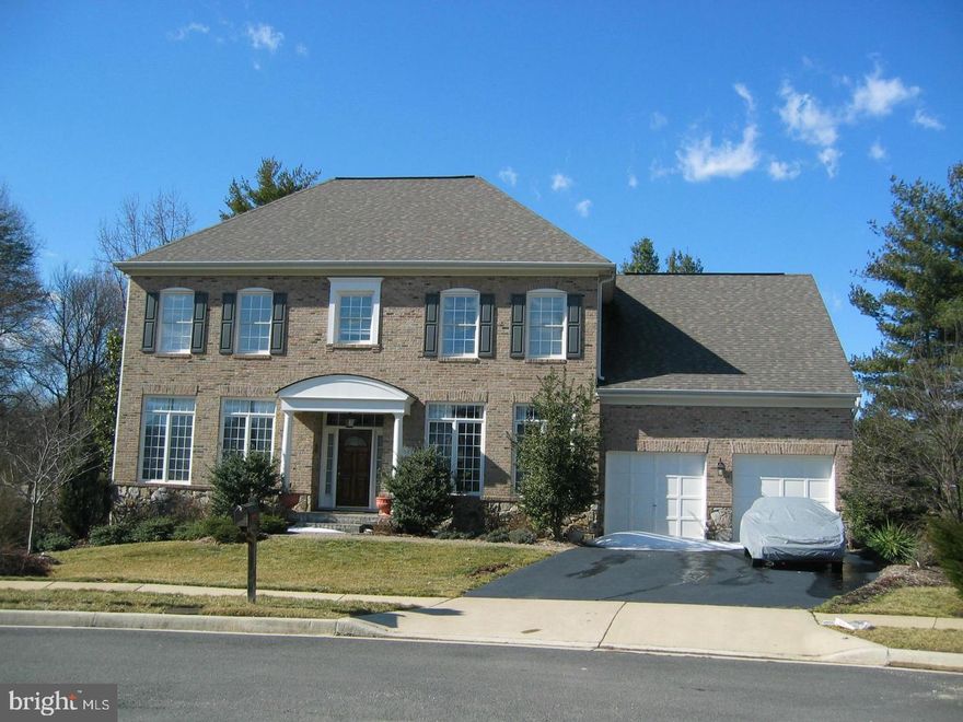 Spacious light filled colonial on Cul-de-sac. Grand entry and first floor with 10' ceilings. Kitchen with granite, cherry cabinets, hardwoods. Master bedroom has great windows, a sitting room, two walk-in closets and a gas fireplace.  The finished walk-out basement includes a full bath, custom painted theater room, possible 5th bedroom and plenty of storage. Large deck off kitchen with a lower-level paver patio and water fountain. Close to Beltway. No smoking, pets case by case. Beautiful home with 2 car garage. Laundry on main level.