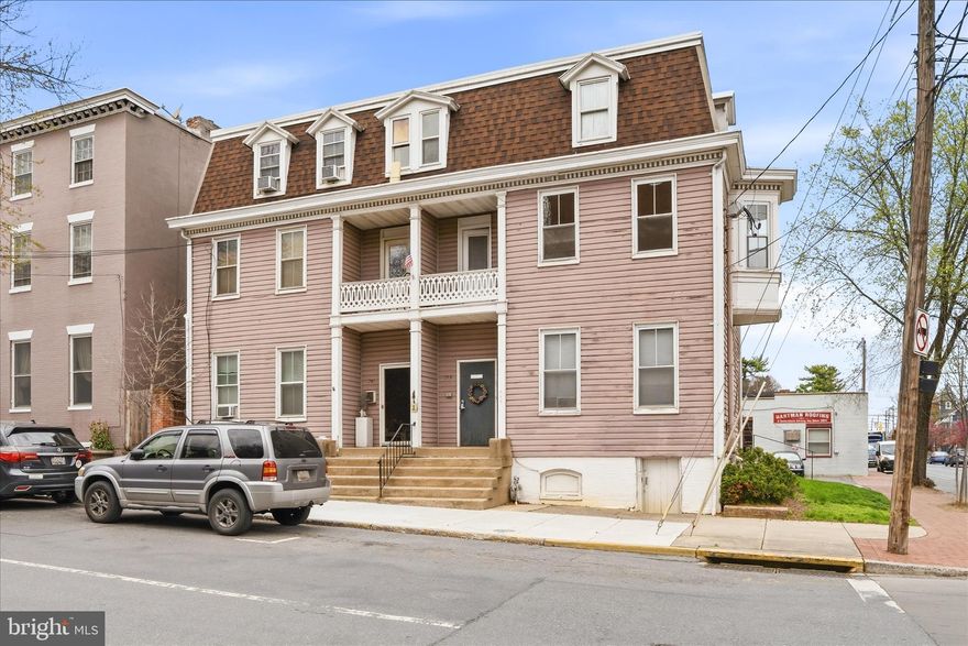 Exceptional investment opportunity in the heart of Downtown Frederick! Perfectly positioned near Eveready Square and just a short walk to vibrant Market Street, this well-maintained 6-unit apartment building offers both convenience and strong income potential.

The property features a desirable unit mix, including three 1-bedroom/1-bath apartments, two spacious 2-bedroom/1-bath units, and one studio apartment—appealing to a wide range of tenants. Each unit offers updated bathrooms, generously sized kitchens, and new electric baseboard heating for efficient comfort.

Tenants enjoy a private parking lot—a rare find in downtown—as well as outdoor seating areas that enhance the property's charm and livability. With its prime location, modern updates, and steady rental income, this is a turnkey addition to any investor’s portfolio.

Don’t miss your chance to own a high-demand, income-producing asset in one of Frederick’s most sought-after areas!

Legal address is 241-243 E 2nd street