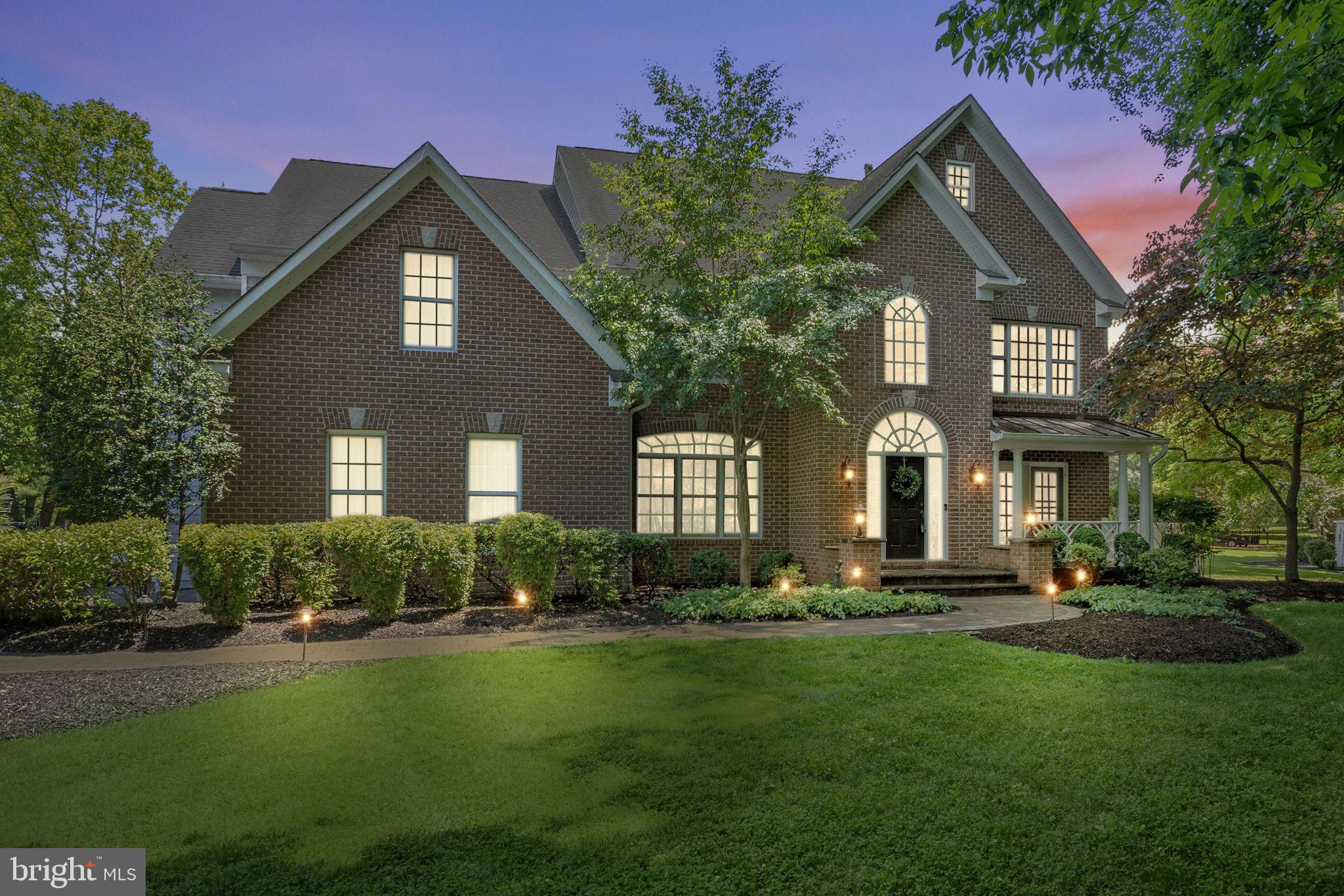 Come and explore the serene lifestyle at 3285 Danmark Drive, nestled in the picturesque community of Glenwood, MD. Glenwood offers a harmonious blend of luxury and nature, situated within the sought-after Howard County public school district, conveniently located between Baltimore and Washington, DC. Relish weekends at the nearby Cattail Creek Country Club, a premier destination for golf and social gatherings. Experience the charm of the Howard County Fairgrounds with its seasonal events and activities. For nature enthusiasts, the proximity to numerous county parks, playgrounds, and trails is perfect for family outings and outdoor adventures.
Arriving at the property, a private tree-lined driveway leads you to this stunning estate. Nestled on a sprawling 3-acre lot, this exquisite home offers a grand sense of arrival and unparalleled privacy. The meticulously landscaped grounds and expansive flat lot provide a perfect setting for outdoor activities and gatherings, all within a serene, natural environment.
Step inside to a grand foyer that opens into the spacious family room with a striking 2-story stone fireplace. A traditional layout seamlessly flows to a formal dining room, a refined home office, and a cozy sitting area, creating an inviting atmosphere for both entertaining and relaxation. The heart of this home is the beautifully renovated kitchen, featuring elegant marble countertops, state-of-the-art stainless steel appliances, and a sunlit breakfast nook. The main level is enhanced by refinished hardwood floors and fresh paint, adding a modern yet warm aesthetic throughout.
Head upstairs to discover a luxurious sanctuary in your new primary suite. This expansive bedroom features tray ceilings, a spacious sitting area, and a huge walk-in closet. The updated bathroom is a spa-like retreat, boasting heated floors, a soaking tub, and a tiled shower that has been featured in The Scout Guide magazine. The upper level also includes three additional bedrooms and two full bathrooms, providing ample space and comfort for family and guests.
Retreat downstairs to a fully finished basement, a true sanctuary of leisure. This versatile space boasts luxury vinyl plank flooring, a spacious recreation room, a guest bedroom, a full bathroom, and a custom bar for entertaining. It also includes a home gym, abundant storage, and a walkout leading directly to the outdoor paradise.
The outdoor space is an entertainer’s dream, highlighted by an inviting in-ground pool and spa. This resort-style pool area features an automatic cover for ease and safety, a large paver patio perfect for lounging, and a composite deck for summer barbecues. The backyard also includes a shuffleboard court, providing endless fun for family and friends. This outdoor oasis is designed for both relaxation and entertainment, offering a luxurious retreat in your own backyard. Discover a perfect blend of luxury, privacy, and community at 3285 Danmark Drive. This exceptional home is more than a residence; it's a lifestyle waiting to be experienced.