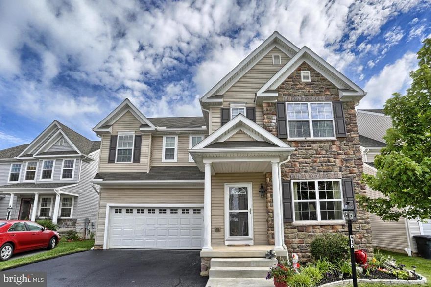 Spacious, open 4 bedroom home in Manheim Township's Worthington neighborhood.  High ceilings, crown molding, gourmet kitchen with tile backsplash and island and gas fireplace in family room.  Finished lower level with built in bar and electric fireplace. Rear 14x12 trex decks leads to spacious backyard. Convenient location.