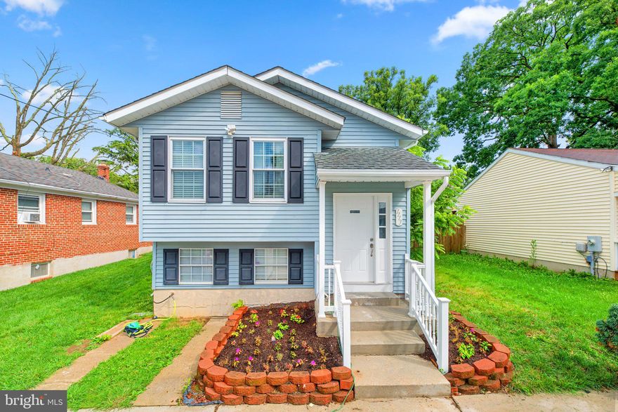 ***Back on the Market 08/31!!***  This split level home is brimming with appeal & warm livability! Enjoy a kitchen with stainless steel appliances, new countertops, sink with insta hot water, custom tile inlay floors and an eat-in area with pass-through for sight-lines to living room/dining room with crown molding and chair rails.  Large closets in every room.   A huge lower level recreation room bathed in sunlight, with BRAND NEW (07/17/2023) CARPET, a full bath and bonus room - perfect for entertaining! Lower level also has a fully functional side entrance.  New carpet in bedrooms, stairs and basement 2023,  Fully fenced yard with patio and deck for summer fun.  Large three car parking pad.  Deck 2023, Front Door 2023,  AC 2022, Dryer 2022, Dishwasher 2022.  Make an offer before this one is gone!