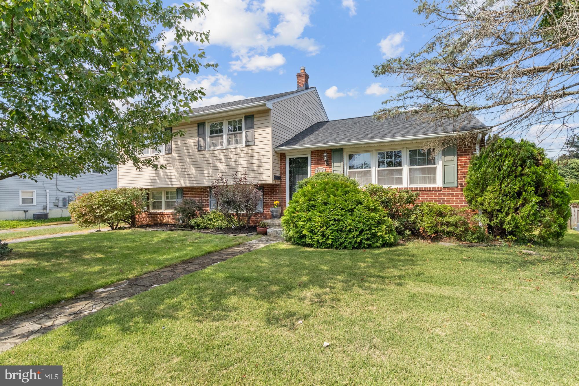 This lovely split-level home in the highly desirable Thornleigh neighborhood offers charm and comfort. Step into a bright and spacious living room with gorgeous wood floors and plenty of natural light streaming in through the large bay windows. The open floor plan effortlessly leads you into the updated kitchen, which boasts ceramic tile floors, updated appliances, and elegant granite countertops, with a wonderful dining area just off the kitchen. The wall has been removed between the kitchen and the dining room with a breakfast bar in between.
Upstairs, you’ll find three generously sized bedrooms with gleaming wood floors and beautiful updated windows, accompanied by two bathrooms. The primary bedroom includes an attached en-suite for added privacy and convenience.
Downstairs, enjoy a large family room, perfect for gatherings or relaxation. This level also includes a laundry area, plenty of storage, and a convenient half-bath. The fully fenced backyard offers a flat, spacious area for outdoor enjoyment. HVAC 2016, New Architectural Shingled roof in 2019.
Don’t miss your chance to call this beautiful home yours!