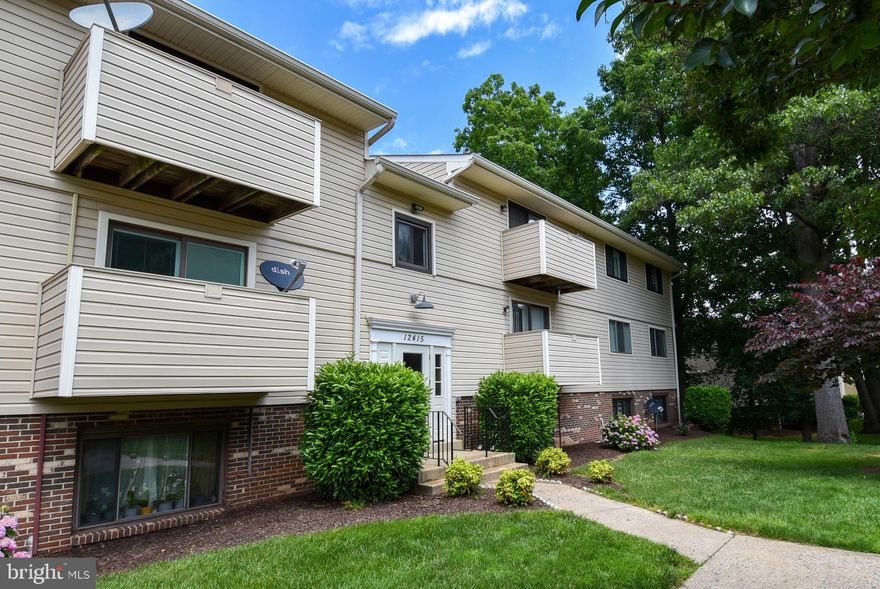 Welcome to this bright and sunny,  2 bedroom, 2 full bath second floor  condo with an open concept floor plan located  in a secure building.  Fresh paint throughout.   Stainless steel appliances and granite counters. 
Beautiful tile backsplash.   Brand new stove.   Granite breakfast island.  Recessed lighting in the living room  and dining room.  Vinyl flooring throughout.   Brand new vanities, mirrors and lights in both baths.  Full size washer and dryer in unit.  Master bedroom has a large walk-in closet and an en-suite bathroom.  Large balcony with lots of sunshine.   Pet friendly.   Assigned parking space close to the building front door.
Within minutes of Germantown Town Center and Germantown Commons, Gold's Gym, shopping, entertainment, bank, library and I-270.