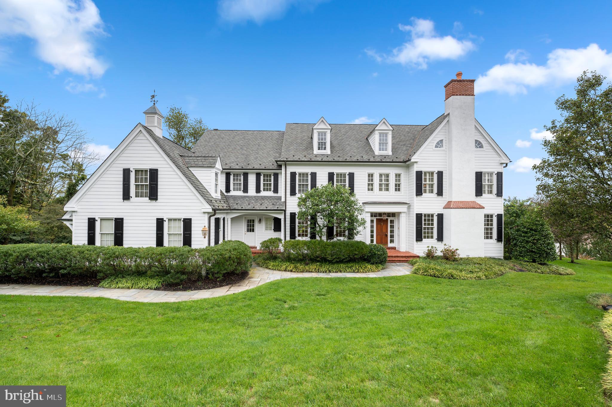 Stunning colonial set on a private cul-de-sac overlooking Applebrook Golf Club! This Pohlig built home offers elegant and versatile spaces, custom millwork, lovely outdoor patio with spectacular views and a large yard making it perfect for entertaining and everyday living! Enter through the grand foyer and you are welcomed by warm hardwoods, custom moldings, a stunning staircase and an abundance of natural light. The formal living room and dining room are both off of the foyer allowing for an open and spacious feel wonderful for entertaining. The kitchen is a chef’s dream with a large seated island, stainless appliances, Calacatta Gold marble counters, walk in pantry and custom white and gray cabinetry. A Thermador gas range with grill and griddle, professional hood, Miele Dishwasher and Sub Zero Refrigerator make cooking in this kitchen anything but a chore! A butler's pantry offers additional storage, a wet bar and wine rack and leads to the large formal dining room. The large great room features a gas fireplace and a coffered ceiling. The home office is tucked away off of the formal living room. A formal powder room with grass cloth wallpaper, back staircase and mudroom with built ins, a 2nd powder room and access to the 3 car garage round out the first floor. The oversized primary bedroom suite is located at the top of the stairs. With a large bedroom, views of the golf course and park, large bathroom and dressing area, complete with window seat, with dual custom outfitted walk-in closets closet this suite will delight! The sumptuous primary bath features custom cabinetry, marble counters, his/her vanities, a dressing area, soaking tub with marble surround with spectacular views, frameless glass shower and a private WC. Bedroom #2 is large with a double door closet and features an en-suite bath with neutral finishes and frameless shower door. Bedrooms 3&4 are both spacious with ample closet space and share a jack and jill bathroom with double vanity, neutral tile, a tub/shower combo and private shower/toilet room. There is an unfinished space with a cedar closet that could easily be finished as bedroom #5 or bonus room! The Lower Level features full sized windows and high ceilings making it a perfect space for finishing. Outside the 1 acre lot allows for privacy and the flagstone patio offers a wonderful dining space for al fresco dining overlooking the golf course and East Goshen Park! All of this located in Award Winning West Chester Schools and convenient to major highways and transportation!