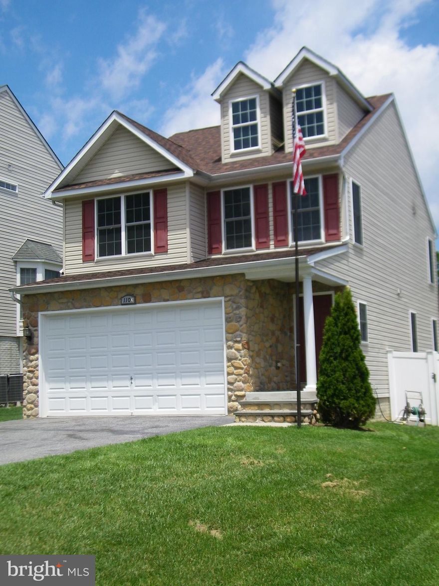 Nothing needs to be done to this home built in 2008 very well maintained,  interior freshly painted, wood flooring main level, tile in kitchen, vinyl fenced yard, composite decking with stone under decking, finished lower level with full bath, closet and door to the outside has been used as another bedroom. granite counter tops and tile back splash just a few of the upgrades. Master suite has oversized walk in closet. Master bath has jetted tub and separate john.  Driveway just repaved, home power washed, garage painted including floor.  Laundry on second floor and huge attic space with pull down stairs just a few features.  Large shed on side of the home. Tax records might be inaccurate to square footage. See documents for original house plans.  Near the B&A bike path and Kinder Farm.