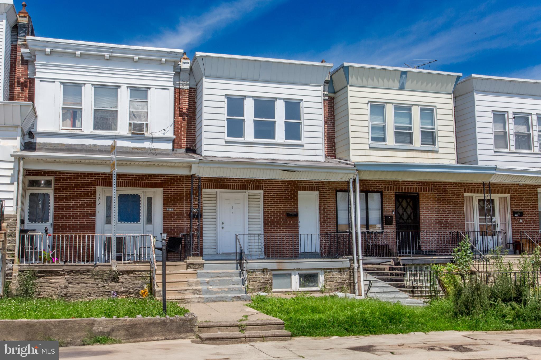 5304 Akron St is a two-unit legal duplex with an active rental license for both units. Located in the Mayfair neighborhood of Philadelphia, ZIP code 19124, this home features a front yard and a covered porch, and a backyard.
The first unit includes one bedroom and a living room. The bathroom for this unit is located in the basement. The second floor comprises two bedrooms but does not have a designated living room.
The basement also contains a washer and dryer, which would be sold as-is with no monetary value assigned. The backyard is fenced. There is an annual fee of $500 for commercial trash pickup.
This two-story home is currently being cleaned by the property manager and is being prepared for showings. Please note, the property is equipped with an alarm system. All photos will be uploaded soon by the listing agent.