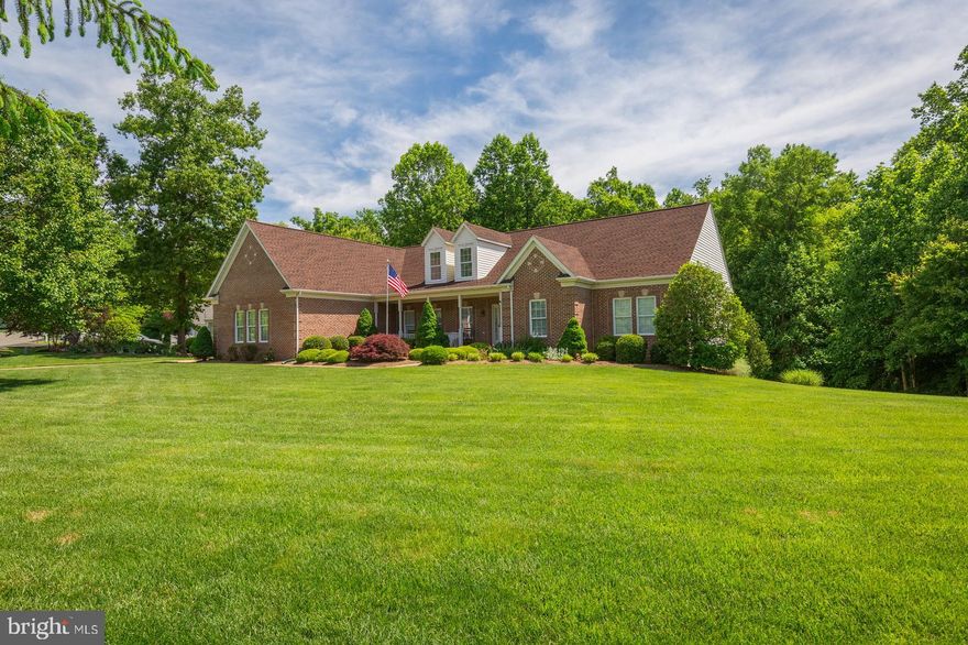 One-of-A-Kind Custom built Rambler on 1-acre lot,(on Public water and Sewer) park like setting backing to trees, manicured lawn. You will Love the view off the back deck (44x 22). Rocking chair front porch. 5 car garage, 3 car attached (30x22) 2 car detached (20x20)  can be converted into She Shed, Man Cave, Workshop etc. Concrete driveway. Upper level has all new flooring. 3 bedrooms plus office could be 4th bedroom, 2 full baths. Master bath has a separate shower, double sinks. Master bedroom has coffer ceiling, Large walk-in closet.  Lower level has a 3rd full bath, walk out to concrete patio full length of the back of the house.   2 HVAC s, Gas heat, 2 water heaters 1 gas, 1 electric. Home sits East to West   Open    floor plan, Split Bedrooms Master on one side, other bedrooms on the other side.  Great location tucked back in the neighborhood with 1 acre plus lots yet so convenient to everything. Cogan High School.  Home has a lawn irrigation system, Roof    replaced 2018with Timberline Ultra HD Shingles (Hickory)