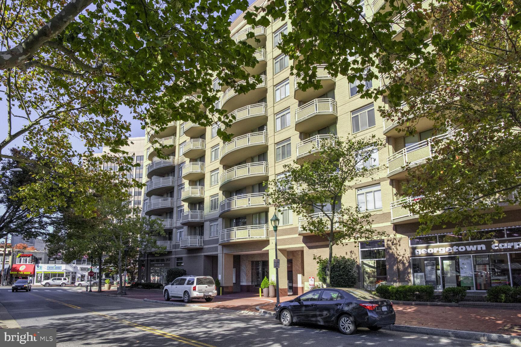 This fully furnished, top floor, 800 sf corner 2-bedroom/1-bath is now available to rent. Unit offers an open living/dining area with access to a south-facing balcony. Kitchen has been updated to feature granite counters, stainless appliances with dishwasher and gas range. Both bedrooms are spacious and light-filled with the primary having a walk-in closet. Rent includes approximately all furnishings shown in photos plus dishes, kitchen tools & flatware, linens/towels. Other amenities include 1 garage parking space, in-unit laundry, and central air conditioning.
The building is within walking distance of many great restaurants and shops like Harris Teeter, Bethesda Row, and Bethesda Metro (walk score 96/100).