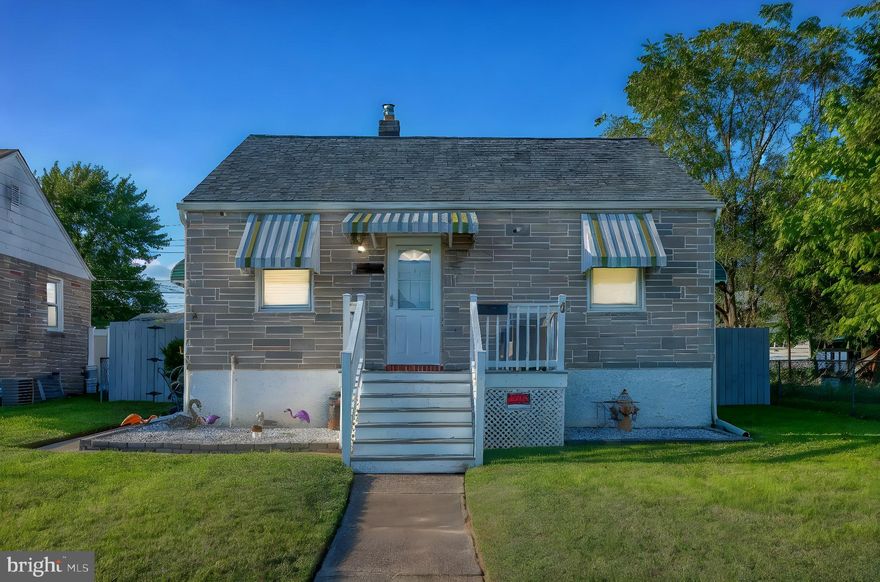 Welcome to your future home—this charming 3-bedroom, 1-bathroom rancher nestled in the tranquil Gray Manor community of Dundalk! As you step onto the inviting front porch, picture yourself savoring morning coffee or unwinding in the evening breeze. Enter through the front door, and you're greeted by a spacious living room adorned with sleek luxury vinyl plank flooring—a cozy gathering spot for family and friends. Next, you’ll find yourself in the heart of the home: a delightful galley-style kitchen. Here, stainless steel appliances gleam against stylish formica countertops, while the trendy backsplash adds a modern touch. Imagine whipping up meals with ease as you enjoy the efficient layout and electric cooking. As you explore further, a sliding barn door reveals a versatile den, featuring hardwood flooring and a ceiling fan—ideal for relaxation or entertaining. This room could easily transform into a dining area, accommodating your gatherings and special celebrations. Continuing your tour, you’ll discover the bedrooms—each offering a unique retreat. The primary bedroom showcases hardwood floors and a ceiling fan for comfort. The second bedroom, with soft carpeting, invites restful nights, while the third bedroom boasts elegant crown molding, adding a dash of sophistication. The full bathroom is a tranquil haven, featuring hardwood flooring and a tub-shower combo, illuminated by stylish sconce lighting. Step outside to the expansive, fully privacy-fenced rear yard—an ideal space for outdoor fun or peaceful relaxation. With a convenient shed for storage, you'll have everything you need right at your fingertips. On-street unassigned parking ensures ease for you and your guests. This rancher not only offers a beautifully maintained interior but also the opportunity to embrace a warm and welcoming community. Schedule a tour today and experience the lifestyle that awaits you in Gray Manor!