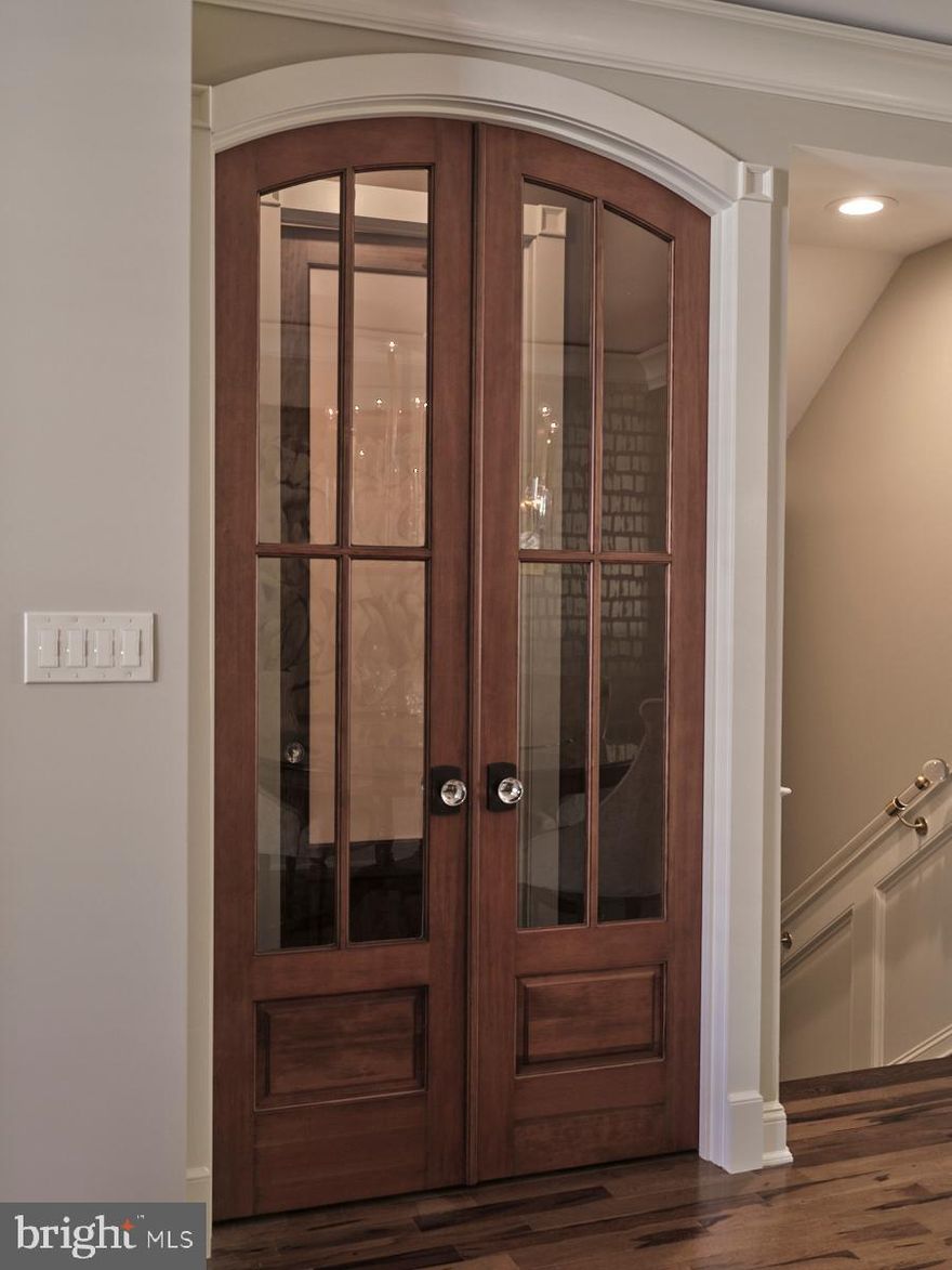 Step into refined elegance at 44 W Mechanic Street, a masterfully reimagined townhome located in the vibrant heart of historic New Hope Borough. Renovated from top to bottom by the esteemed Arbor Hill Interiors, this exquisite residence offers a rare opportunity to enjoy sophisticated, turn-key living just steps from the river, art galleries, fine dining, and boutique shopping.

Every detail of this exceptional home has been curated with intention and luxury in mind. From the Brazilian walnut hardwood floors throughout to the Phillip Jeffries designer wallpaper, custom Hunter Douglas plantation shutters, and Lucite handrails on every staircase, the aesthetic is as elevated as it is timeless.

The first floor is designed to impress, featuring bespoke custom millwork, shelving, and molding, paired with a stunning marble fireplace remodel and tray ceiling accentuated with LED lighting. The chef’s kitchen is a culinary dream, boasting high-end built-in appliances, custom cabinetry, a designer vent hood, and marble backsplash—all blending seamlessly into a space meant for both entertaining and everyday living.

Ascend the handcrafted staircase with its custom brass railing to the second floor, where the primary suite exudes tranquility and sophistication with SSS Custom Closets, a fully renovated spa-like bathroom with heated floors, and a beautifully reimagined guest bath featuring a floating wood vanity. The fully remodeled laundry room offers abundant storage, a mud sink, and new washer/dryer (2023).

The third floor offers incredible flexibility—ideal as a second primary suite or luxurious guest retreat, featuring two additional custom closets by SSS, an electric fireplace, a spa-style bathroom with soaking tub, double-width glass shower, double vanity, water closet, heated floors, and accent lighting. A striking glass wall along the staircase enhances light and flow, elevating the modern design sensibility.

The lower level includes a stylish flex space with glass walls, a dedicated wine refrigerator room, and an impeccably finished garage with epoxy floors, built-in storage, custom molding, and glass-and-steel entry enhanced by sconces. Additional conveniences include a whole-house water softener system, a new hot water heater, a professional-grade server rack, and seven security cameras for peace of mind. The residential elevator is equipped with an automatic door for ease and elegance.  Outside there is plenty of spaces for your guests along with your two car garage!

44 W Mechanic is more than a home—it is a statement in luxury, location, and lifestyle. Every inch has been thoughtfully crafted to blend comfort, technology, and design in  Bucks County’s most sought-after boroughs.