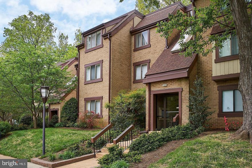 Welcome to 1650 Parkcrest Circle! Unit 300 is a truly stunning, top-level condo with soaring ceilings, floor-to-ceiling windows, and an abundance of natural light. It features an updated, open-concept kitchen with granite counter tops and stainless steel appliances; beautiful hardwood floors in the hallway, living room, dining room, and kitchen; and in-unit washer and dryer. The 2 spacious bedrooms feature neutral carpet and paint. The bedrooms share a full bathroom, which is located in the hallway. The view of lush, mature trees from the private balcony located off of the living room is incredibly peaceful, making it a wonderful spot to work from home or to simply relax. Ample free parking for residents and guests is available in a private lot and all utilities are included in the rent! (Internet is separate.) New HVAC in 2024. A walking / biking path leads directly to the metro in 15 minutes. Just a 1.3 mile drive to the Wiehle-Reston Metro and Reston Station, a 1.8 mile drive to Reston Town Center, and a 1.1 mile drive to Lake Anne. Be close to all that Reston has to offer living on Parkcrest Circle!