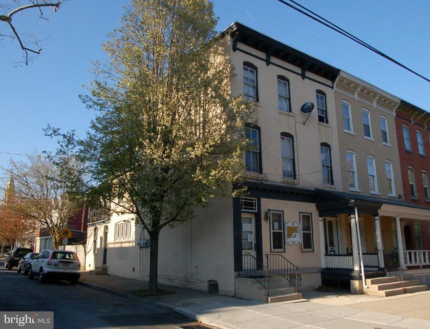Chestnut Hill 3 Unit.  Including 1st floor commercial space.  Additional units on the 2nd and 3rd floor, plus a 4 car garage.  Good Income.