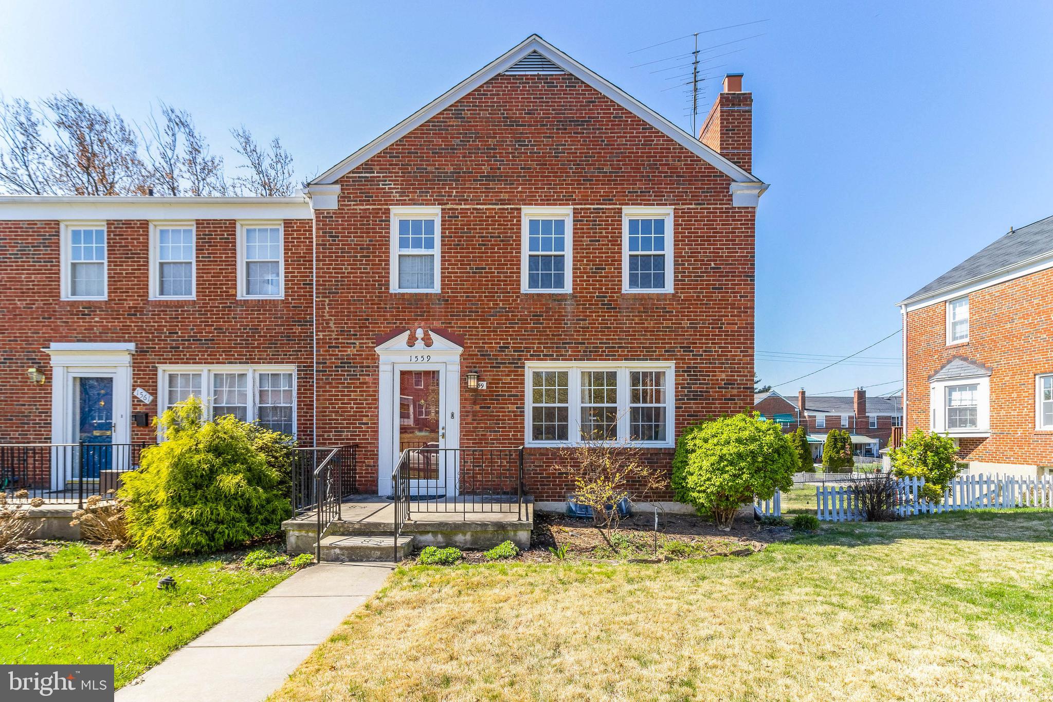 What a Lovely End Of Group in Loch Raven Manor that is ready for new owners! The hardwood floors on the first floor are just gleaming, recent paint is bright and inviting! Enter through the vestibule with closet, the bright and spacious first floor living area with fireplace welcomes you home. Large, eat in kitchen with built-in island/seating area, nice back porch with a new awning to enjoy the warmer months.
The lower level has brand new carpet on the stairs and in the family room, which also has a fireplace. There is a quarter bath ready to be expanded. The utility area leads to a walk-out door to the back yard with a built-in storage area for your outdoor needs. A large parking pad makes life easier - no worries on finding a spot! Upstairs has three generously sized bedrooms with hardwood floors and lots of windows and light. The owners have loved their home, and it shows!