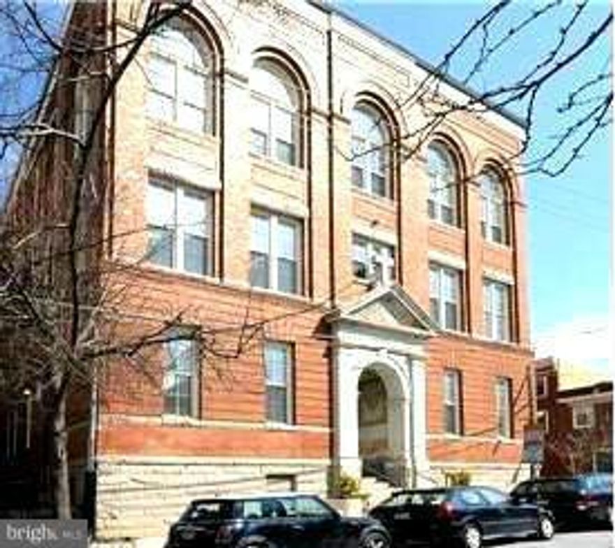 Unique 2 Bedroom, 2 Bath loft condo in the heart of Federal Hill.  14ft + ceilings with large windows- hardwood floors.  Updated kitchen with granite counter tops and stainless steel appliances.  Spiral staircase leads to upstairs bedroom overlooking living room and kitchen.  Secure building with elevator and garage.  Beautiful architecture.  Must see!