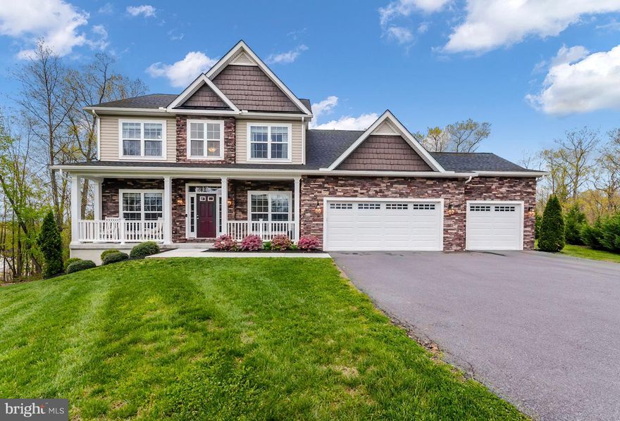 Arguably one of the premier homes in Brookfield on the Potomac. This Executive home provides the convenience of easy access to I81 while being in a beautifully maintained and highly sought after community.  Brookfield on the Potomac provides each homeowner with deeded access to the Potomac River amenity that includes boat ramp, picnic pavilion and play area.  This home has been well appointed and tastefully finished to suit the most discriminating tastes.  There are hardwood floors throughout the main level which includes the gourmet kitchen, living room, den (could be a 6th bedroom), family room with gas fireplace, formal dining room, and breakfast room.  The downstairs has a large bedroom, full bath and large open recreation room. The master suite on the 2nd level is your sanctuary from hectic days and includes a deluxe owner's bath with soaking tub, separate shower, water closet, gorgeous tile and double sinks.  The backyard is accessed by the walk-up stairs or back French door to the stamped concrete patio and enclosed by a decorative fence.  The home sits back from the quiet cul-de-sac on a beautifully level lot and includes a wooded area in the nearly 2 acre lot.  Home provides a 3-car garage with a custom locker and bench entry way.