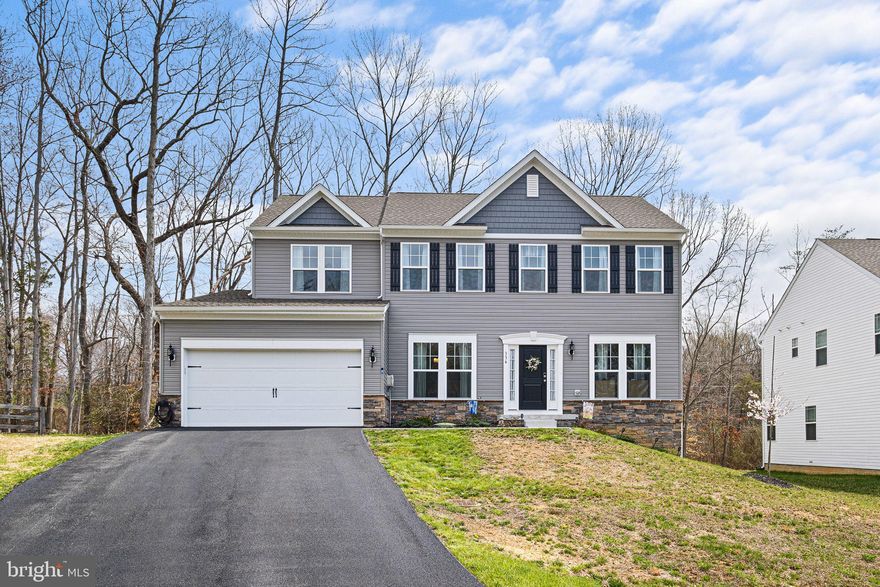 Now Available Due to Job Relocation – Your Dream Home Awaits in Elk Nest!  Welcome to this stunning colonial-style home in the sought-after Elk Nest community!  Boasting 4 spacious bedrooms, 2.5 baths, and a 2-car garage, this home offers the perfect blend of comfort, style, and functionality ideal for both everyday living and entertaining.  Step inside through the impressive two-story foyer and you’ll immediately notice the upgraded flooring that flows seamlessly throughout the main level, setting an elegant tone.  To the left, host unforgettable dinners in the formal dining room.  To the right, a set of double doors opens into a versatile home office perfect for remote work or a quiet study space.  At the heart of the home is a beautifully appointed, eat-in kitchen that will delight any chef.  Enjoy granite countertops, stainless steel appliances, a deluxe center island, and 42" soft-close cabinetry.  A walk-in pantry, recessed lighting, and thoughtful finishes add both charm and functionality.  The kitchen opens to a bright and airy great room, featuring a cozy gas fireplace, a large ceiling fan, and abundant natural light pouring in through oversized windows.  Upstairs, retreat to the luxurious primary suite with a generous walk-in closet and a spa-inspired Roman bath complete with tiled floors, a double granite vanity, and a private water closet.  Three additional bedrooms offer ample closet space and share a well-appointed full bath with double sinks, tiled flooring, and a tiled tub/shower combo.  The second-floor laundry room adds everyday convenience.  The unfinished lower level provides a blank canvas for your future dreams, featuring a 3-piece rough-in for a bathroom and an egress window ideal for adding living space, a home gym, or a guest suite.  Perfectly situated just minutes from major travel routes, top-rated restaurants, Elk Neck State Forest, marinas, and local boutiques, this home offers both peace and accessibility.  This home is only a year old and has a transferable builders warranty.  Don’t miss your chance to call this exceptional property home. Schedule your private tour today!