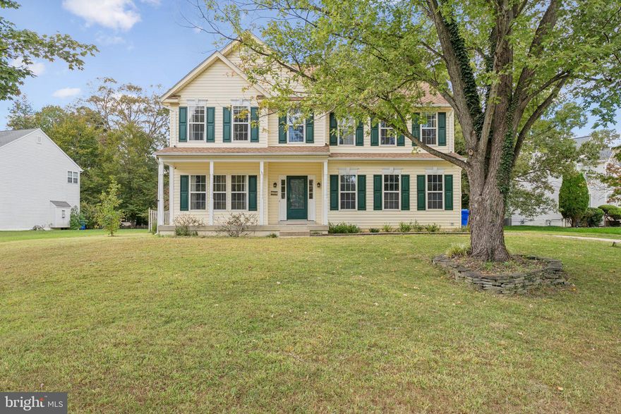 Spectacular and charming colonial home on a corner lot with over 3,000 square feet of beautiful living space in the Highgrove Subdivision. The inviting front porch welcomes you into a bright foyer. Off the foyer is a home formal living room with French doors leading to the dining room. Continue on to the huge eat-in kitchen with Brazilian granite countertops, stainless appliances, and a breakfast bar. The kitchen opens to a formal living room. Off the living room there's an office with a built-in desk and shelving system and a convenient half bath. On the second level the primary bedroom has a full en-suite bath with a stand-up shower and separate deep soaking tub, plus two generous closets plus a bonus den. This level has three additional bright, great sized bedrooms, a full bath, and a laundry room. The finished walk-out basement offers additional recreation space, storage space, and a full bath. The attached two-car garage has extra space for storage and dedicated electricity for a workroom. French doors off the kitchen lead to the amazing large rear yard with sundeck, fully fenced with an idyllic shaded stone patio, an Amish-built shed for extra storage and a nine zone sprinkler system. This home also has an whole home generator (fully automatic, 20 kw), newer HVAC system, and a newer roof with 50 year architectural shingles. Close proximity to DC, Alexandria, and all of the beautiful Southern Maryland sights. The National Harbor is a short drive away, making for an easy night out on the water.  Hop on the 301 corridor to easily access Richmond and Baltimore. Highgrove is a quiet neighborhood with plenty of curb appeal & access to everything you need! This is comfortable and spacious living at its best!