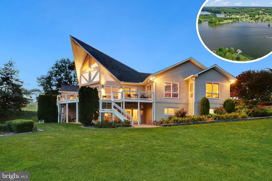 Welcome home to 5807 Blue Ridge Road at Lake Anna! This spectacular, custom designed home sits perfectly on an acre of land with approx 260 feet of waterfront! These original homeowners boast a ton of pride of ownership throughout this 5200 finished square foot home. As you enter the home, you are greeted with 180 degree views of the lake. The homeowners have loved the versatility, which lends itself to entertaining. The additional rooms accommodate visiting overnight guests. The 30 foot high ceilings and architectural shaped windows in the main area allow the natural light to flow through the open floor plan which makes this the heart of the home. Enjoy sitting in front of the wood heatilator fireplace, eating and gathering in the dining area, watching tv in the built-in entertainment center, and relaxing in front of the wonderful views. Top down-bottom up cordless honeycomb cellular shades are installed and built-in wall sconces with dimmers, add to the character. From the main room, step out on the huge deck which is the length of the back of the home. The renovated kitchen includes granite countertops, an electric cooktop, dual wall ovens, subway tile backsplash, huge walk-in pantry, and a kitchen island with pendant lighting. The office has two walls of custom cherrywood built-in bookcases and again wonderful views of the water. The spacious primary bedroom suite has a ceiling fan, custom built walk-in closet and views of the lake. The primary bathroom has a jacuzzi tub, walk-in shower, tile flooring, and two stained glass windows. Lighting is brought in during the day via a solar tube. The second bedroom at the other end of the house has french doors leading to the spacious deck with water views. The third bedroom is also located on the main level at the other end of the home with views of the lush front yard. Both of these bedrooms have ceiling fans and ample closet space. A full bathroom is located between them. Conveniently located off the kitchen is a laundry area, and mud room that leads to a two car garage. Step on down to the fully finished basement/family room for even more space. The back wall of floor-to-ceiling windows looking to the lake, recessed lighting on dimmer switches, and multiple ceiling fans make this another level of entertainment. The wood stove is nestled in a corner to provide extra warmth on those cold days. The wet bar comfortably seats 5 and there are multiple areas for game tables. There is a great room ready to be a movie theater room w/speaker wires already in place. To boast there is an exercise room, craft room, and a workshop area. The third full bathroom is located here with a huge walk-in shower, jets and a tile seat that is great for rinsing off. You will appreciate more garage space, with epoxy flooring, located down here where you can park anything from lawn tractors to your boat. From the basement, you can walk out to the patio for outdoor entertainment, and make your way down to the dock. Enjoy the mature landscaping surrounding the home. Some additional features include a portable backup generator, water treatment system, alarm system, Fiberlink internet service, and raised flower beds in the yard. Recent updates include: upgraded deck and railings (2023), two new Trane HVAC units (2021), washer & dryer, primary built-in closet, built-in pantry, driveway, and front entry (2020),  new roof w/ 50 year shingles and gutters (2016), new roof with 30 year shingles for the boathouse (2016), renovated Kitchen (2015), 80 gallon hot water heater & circulating pump (2010). Enjoy the sunsets sitting on your own dock overlooking the grand view of Lake Anna. It's approximately 8 feet deep at the ladder on the dock and one boat slip in your covered boat house and approved plans to add another slip. This home is just half a mile from Route 522, and centrally located to Fredericksburg, Richmond, and Charlottesville. Hop on your boat to local dining. The lakefront lifestyle is calling your name!