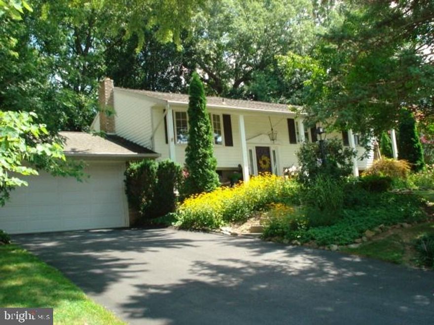 Amazing space and quality throughout this 4 bedroom, 3 bath home in convenient Colonial Heights! 3 additions to original house provide sunroom, great room and master suite with gas fireplace and dressing room. Deck overlooks private, wooded lot with fire pit and playhouse. Absolutely gorgeous home with open floor plan and 2 master suites, great for entertaining!  Minutes to I83 for commuters.