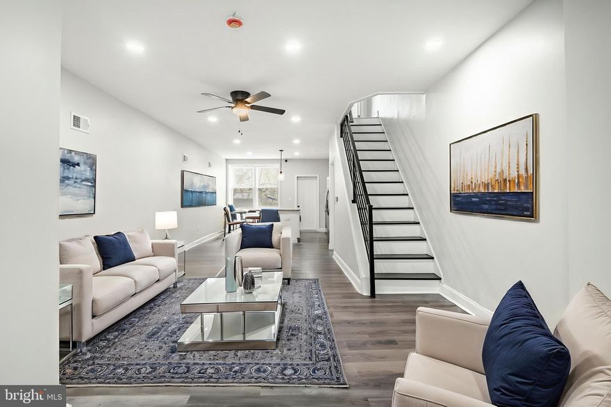 Welcome to 5302 Hadfield St! Discover your dream home in  Philadelphia. This newly renovated gem seamlessly blends modern luxury with functional design, creating the perfect space for contemporary living. Step inside to find a beautifully updated home where every detail has been thoughtfully considered. The open floor plan effortlessly connects the living room, dining area, and kitchen, making it ideal for entertaining. Recessed lighting enhances the bright, airy ambiance, adding a sleek modern touch. The kitchen is a chef’s dream, showcasing exquisite quartz countertops, sophisticated cabinetry, and state-of-the-art stainless-steel appliances—including a brand-new refrigerator with built-in water and ice dispenser. Ample counter space and an abundance of cabinet storage provide both functionality and style, while the sleek, modern design makes it perfect for effortless cooking and elegant entertaining. Upstairs, you’ll find three spacious bedrooms bathed in natural light. The main bathroom offers a spa-like retreat with elegant floor-to-ceiling tile work. A convenient half-bath on the first floor adds extra comfort for guests. The basement provides endless possibilities, whether you envision a home gym, office, or additional storage to keep your space clutter-free. Step outside to your private backyard—ideal for summer barbecues, gardening, or simply unwinding in a peaceful setting. A brand-new HVAC system ensures year-round comfort with central air and heat. Conveniently located near parks, shopping centers, and public transportation, this home offers easy access to everything Philadelphia has to offer. Just minutes from the airport, top-rated schools, and popular dining spots. Plus, qualified buyers may be eligible for up to $20,000 in grants, making this incredible home even more affordable! Don’t miss your chance to own this exceptional property. Whether you're a first-time home-buyer or looking for your forever home, 5302 Hadfield St. is ready to welcome you. Schedule your showing today!