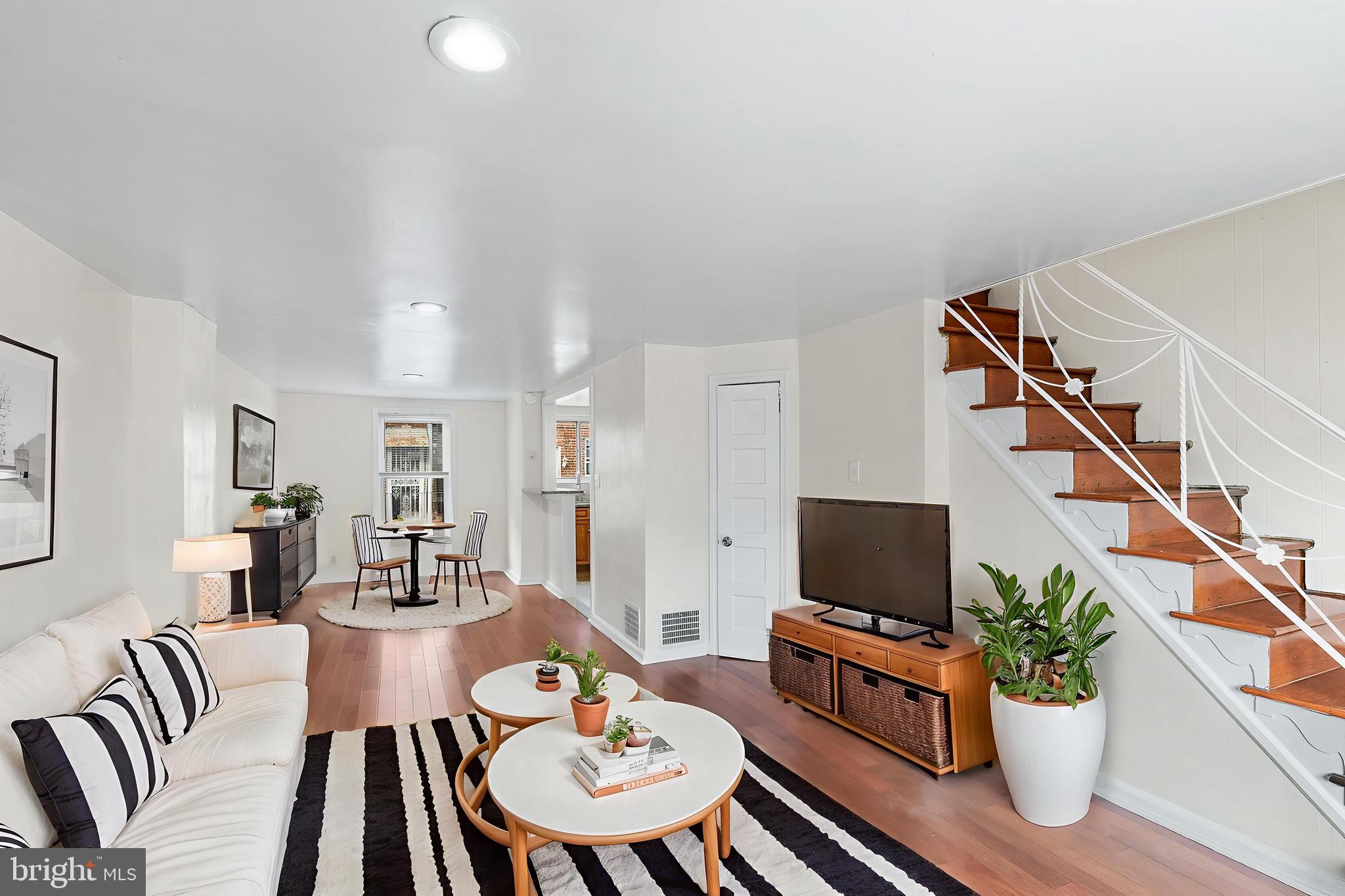 Back on Market due to financing falling through. Welcome to this beautiful three-bedrooms, one bath townhouse in Philadelphia, eligible for GRANT programs. This beautifully renovated property boasts a spacious first level with hardwood floors, living room, dining room, and updated kitchen featuring granite countertops, wood cabinets, and tile backsplash. The second level includes a main bedroom, full hallway bath, and two additional spacious bedrooms with ample closet space. The finished walkout basement with a rear exit access to a one-car garage. Recent upgrades include; brand new real hardwood floors on both levels, new windows on second floor, new kitchen floor and bathroom floor, and fresh paint throughout the house etc. Enjoy easy access to shopping, restaurants, public transportation, and major highways. This property is easy to show and available for immediate occupancy. Schedule your showing today !