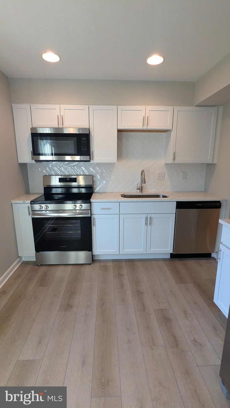 Beautifully updated end unit townhome in sought after Kimberly Woods Village!  All new HVAC, HWH, paint, LVP flooring on the main and lower level, new carpet, white kitchen cabinets, stainless steep appliances, quartz countertops, all new bathrooms, railings, the list goes on and on!  Close to major highways, downtown Annapolis, beaches!