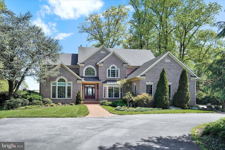 Major price improvement-don't wait! This stunning residence, situated on over two acres, with lush landscaping, in a park-like setting, was sited to provide year round panoramic views of the Severn River. The sensational views and the incredible waterside amenities, include a waterside HEATED in-ground pool, with a sunken spa, an extensive paver patio, with custom pergola, grand outdoor fireplace and separate pool-side built-in grilling/kitchen area, sets the perfect stage for immersing oneself in the Chesapeake waterfront lifestyle. With the installation of the new tram, (2021) water enthusiasts can easily access the private pier, featuring a 10,000 lb boat lift and 8 feet MLW! This beautifully designed home begins with the striking two story foyer with marble flooring. From the foyer you are drawn to the grand two story great room, which is highlighted by the floor to ceiling windows, which afford captivating views of the Severn River and features hardwood floors and a fireplace. The spacious waterside kitchen with sitting area, vaulted ceiling and bay window, is a chef's dream, with high end features, including Kraftmaid cabinets*granite countertops*island*ceramic flooring*Bosch dishwasher and Bosch 5 burner cooktop*desk area and crown molding. French doors open directly to the large paver patio, on which sits the fantastic waterside amenities. Other dining entertaining options include the open dining room, which can accommodate formal and informal gatherings and features marble flooring and high end molding. Grand water views are yours from the luxurious primary bedroom, featuring a cozy (gas) fireplace, tray ceiling, spa-like bath, with soaking tub*double vanity sinks with granite top, an oversize tiled shower and two walk-in closets. Working from home? A convenient office is also located on the main level. The upper level boasts four bedrooms including two with a private (en-suite) bath and another "jack and jill" arrangement. Friends and family can gather in the expansive lower level, which features a family room, club room and full bath! Whole house 30kw generator too! Don't miss this opportunity to fulfill your dream of living the Chesapeake waterfront lifestyle! FEEL FREE TO OPERATE THE TRAM. Can be shown for back up contracts