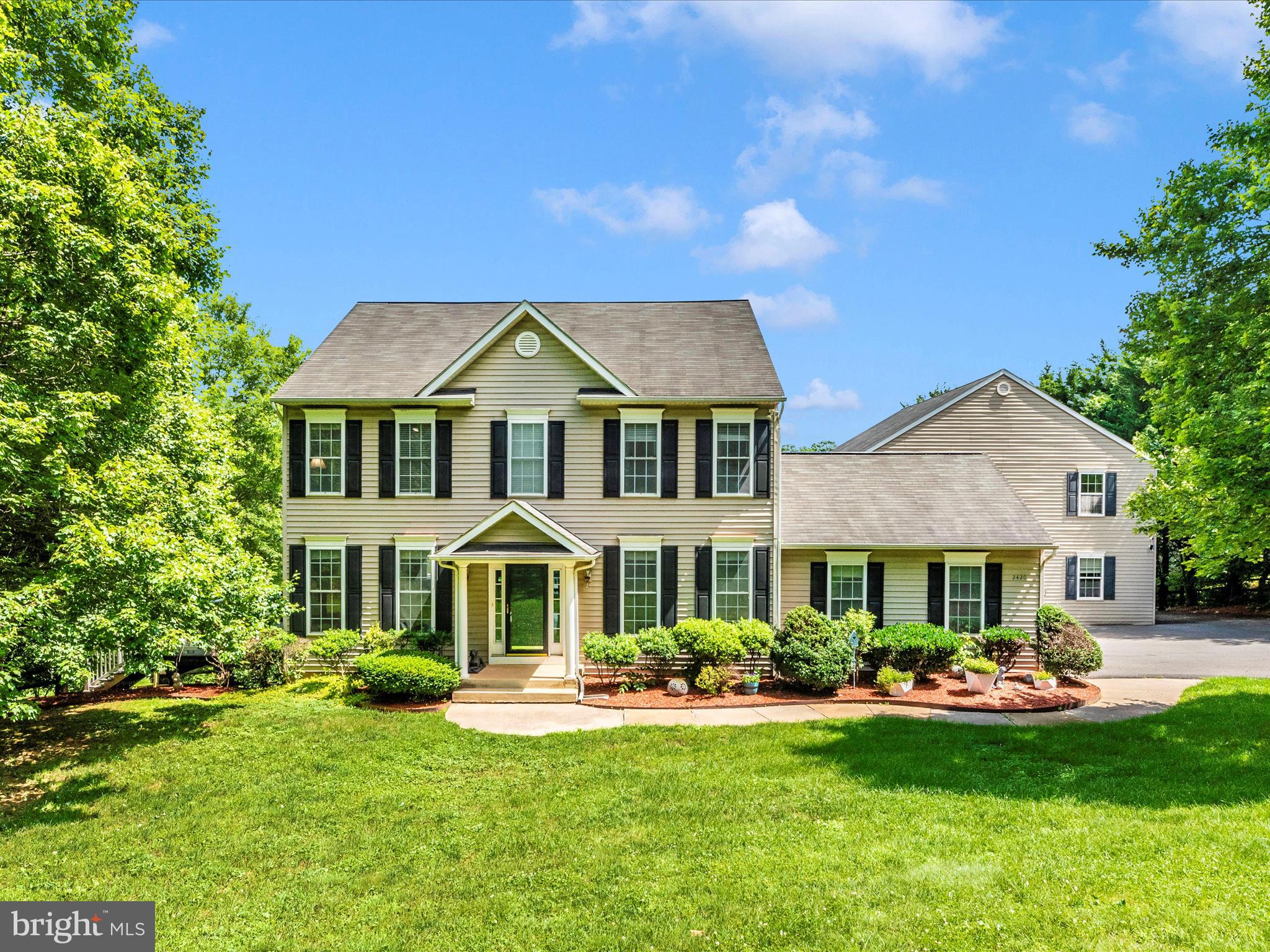 A Nature Lover’s Dream Retreat!
Welcome to your private sanctuary tucked away on a peaceful country road—over 7 acres of pure outdoor paradise await! As you turn onto the secluded driveway, this home immediately invites you into a lifestyle of tranquility, adventure, and comfort.
Step out onto the expansive deck and take in panoramic views of rolling green lawns, serene woodlands, and the meandering Bennett Creek. With multiple seating areas, you can enjoy morning coffee with the sunrise or unwind in the evening while listening to the sounds of nature. Explore walking trails, host picnics under the trees, or cast a line in your own private fishing spot along the creek. On cool nights, gather around a crackling campfire in your park-like backyard—or slip into the recessed hot tub on the deck for a soak under the stars.
Rainy day? No problem. A covered portion of the porch offers the perfect spot to relax and watch TV while still enjoying the fresh air.
Inside, the main level features an open-concept living space where the family room, kitchen, and dining area flow together seamlessly. Cook and entertain with ease while staying connected to guests enjoying the fireplace or watching a movie nearby. A versatile bedroom (ideal as a home office or guest suite) and a full bathroom complete the main floor.
Upstairs, the spacious master suite includes a walk-in closet and a spa-inspired bathroom—your own private escape. Three additional bedrooms and another full bathroom provide ample space for family or guests.
The finished lower level adds even more flexibility, featuring a cozy fireplace, a unique epoxy flooring, a casual entertaining area, a private gym space, plus an additional bedroom and full bathroom—perfect for guests, extended family, or your own personal retreat.
Car enthusiasts and hobbyists will love the garage setup: a 2-car attached garage plus an oversized 2-car detached garage for extra vehicles, boats, or recreational toys. Above the detached garage is a finished bonus space with a large open room and two smaller rooms—perfect for a game room, office, expanded gym, creative studio, or whatever suits your lifestyle.
This property offers the perfect blend of outdoor adventure and modern comfort. If you’ve been searching for a home that feels like a retreat—look no further.