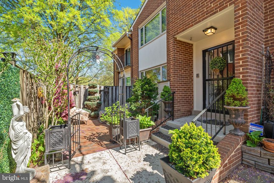 ***Open House this Sunday, April 21 from 12-2 p.m.*** This is an excellent opportunity to own a rarely available end-unit townhome style condo in Alexandria’s Seminary Heights. This well-maintained and beautifully updated three-level home features 2 bedrooms and 3.5 baths. Pride of ownership is evident throughout this light-filled home. Upon entering, you will be greeted with gleaming hardwood floors and an updated kitchen with stainless-steel appliances and granite countertops. The upper level boasts two primary suites, each with attached updated full baths and gorgeous luxury vinyl plank flooring. The larger primary suite has two large closets and a balcony. The basement recreation room makes it easy to relax with a floor to ceiling brick, wood-burning fireplace, and a wet-bar equipped with a wine refrigerator. The bar and bar stools convey. The additional room in the basement is perfect as an office, exercise area, or guest space, and there is a third full bath in the basement. You will love the fenced-in brick patio and outdoor living space, which makes gardening and entertaining a breeze. The patio furniture conveys, which includes a high-quality Summer Accents patio umbrella with lighting. Incredible location! Conveniently located within walking distance of the Mark Center, which provides plenty of shopping, dining, and many commuting options nearby.