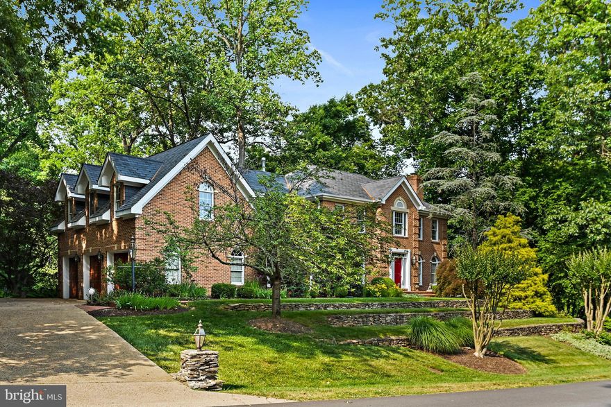 A rare opportunity presents itself to experience the best of Northern Virginia living in gorgeous Oakton. 
This magnificent property features the highest standard of quality craftsmanship and finishes.  The floor plan is thoughtfully laid out offering flexible spaces for formal and casual gatherings alike.  Enjoy hardwood floors, built-ins, extensive molding and trim and more. The main-level interior offers a curved staircase, marble foyer, private office, formal living room with a fireplace, dining room with a Butler's pantry and a large kitchen with TWO refrigerators.  Stunning views of the backyard and patio areas. Just off the living room is a light-filled office/study with French doors. The upper-level features four generous bedrooms, including a large primary bedroom and bathroom with two walk-in closets.  Attached is a gorgeous sitting room with a fireplace .  Three additional bedrooms with two full bathrooms are located on the upper level.  The finished walk-out lower level features a wet bar, fireplace, full bathroom and tons of storage!  Ample storage space throughout the entire house and a 3-car garage.  Situated on over .8 acres, this estate offers professionally landscaped grounds, extensive hardscaping and a backyard space with plenty of room for play and entertaining.  No matter the season, this is where you will want to be. 

County parkland is threaded throughout the community. Terrific for running, biking or walking. It is a short drive to the Silver Line Metro and downtown Reston, Fairfax and Vienna.   Madison High School Pyramid. Home shows light, bright & airy!!

Don't miss the opportunity to make this extraordinary home yours!