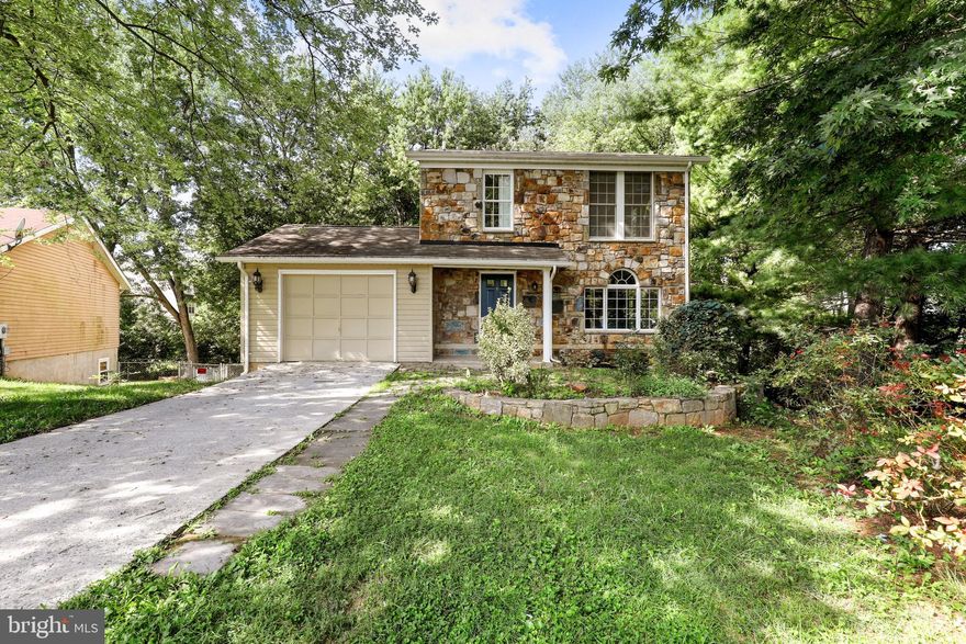 Beautiful 3BR, 2.5 bathroom home in the heart of Stonegate Farms neighborhood!  Newly hardscaped, with a spectacular wooded view and fenced in yard. The backyard includes a brand new outdoor fire pit and the home has been freshly painted throughout! Equipped with a spacious primary bedroom with connecting full bathroom, and 2 more generous sized bedrooms, with an additional full bathroom in the upstairs hallway. The walk out basement includes a wet/dry bar and PLENTY of storage space. The kitchen allows access to the newly painted deck, making a tranquil place for friends and family to gather. Priced to sell!