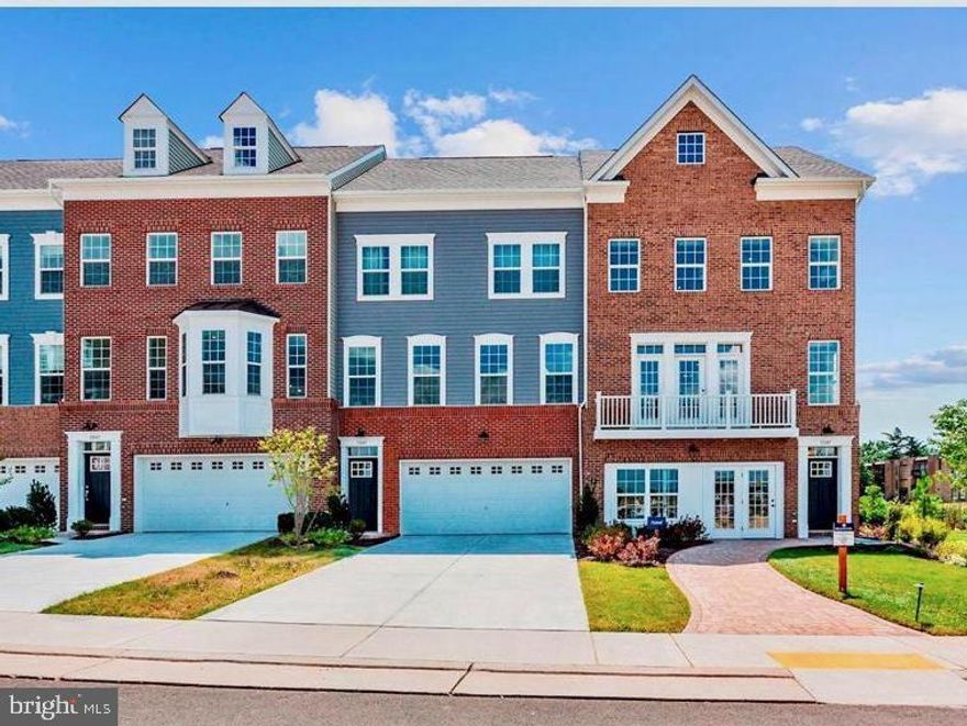 This luxurious and spacious 3-level townhome, built in 2020, offers a modern and bright open concept design perfect for luxurious living and entertaining. With a freshly painted, 3 bedrooms and 3.5 bathrooms, there is plenty of space for families or those who love to host guests.
The kitchen boasts stainless steel appliances and a gorgeous, oversized quartz island, ideal for gatherings and culinary adventures. Step out onto the enormous deck to enjoy your morning coffee or unwind after a long day. The upper level features a generously sized primary bedroom with an ensuite bathroom that includes a double vanity and quartz countertops. A huge walk-in closet completes the upper level, offering plenty of storage space.
Residents of the Blackburn community can take advantage of amenities such as a clubhouse, gym, and pool. Plus, the location offers easy access to major routes like Rt 66, Prince William County Parkway, and Rt 29, as well as the VRE station in old town Manassas. Nearby shopping, dining options, and local wineries and breweries ensure there's always something to explore and enjoy.