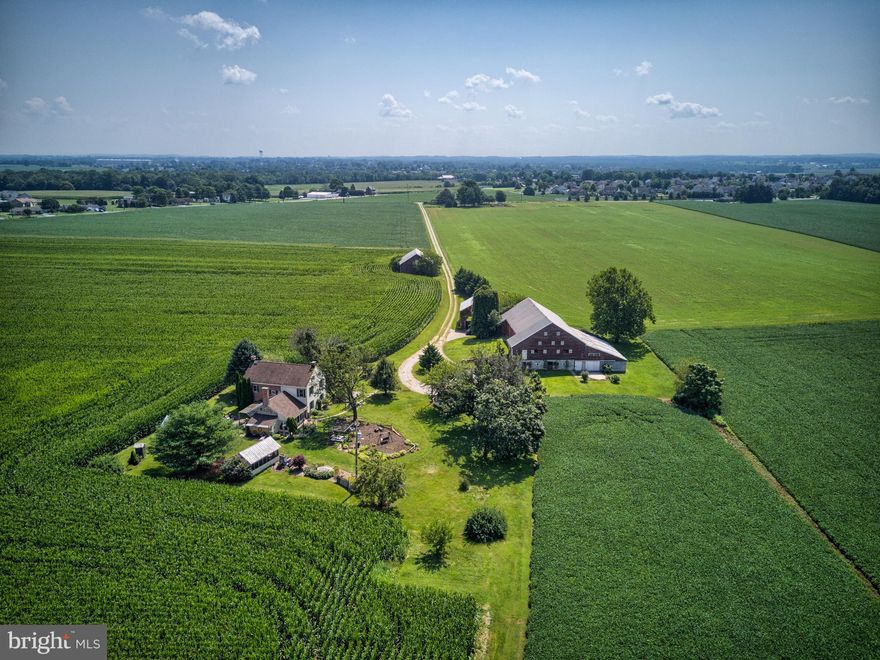 One Hundred Sixty Six Acres of beautiful, scenic and flat farmland with a charming farmhouse nestled in the middle of it all. The original part of the home dates back to 1855. The home supports three bedrooms and two bathes. There are wonderful gardens around the home with a large barn and outbuildings.